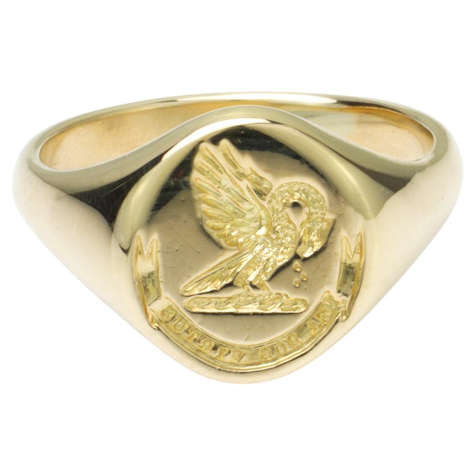 18kt. yellow gold men's signet ring with dragon and Latin phrase Mea Dos Virtus.

 “Mea dos virtus”, which translated from Latin to English as virtue is my dower.

Made in England, After 2000
Maker: DOM
Fully hallmarked.

Dimensions:
Ring Size: