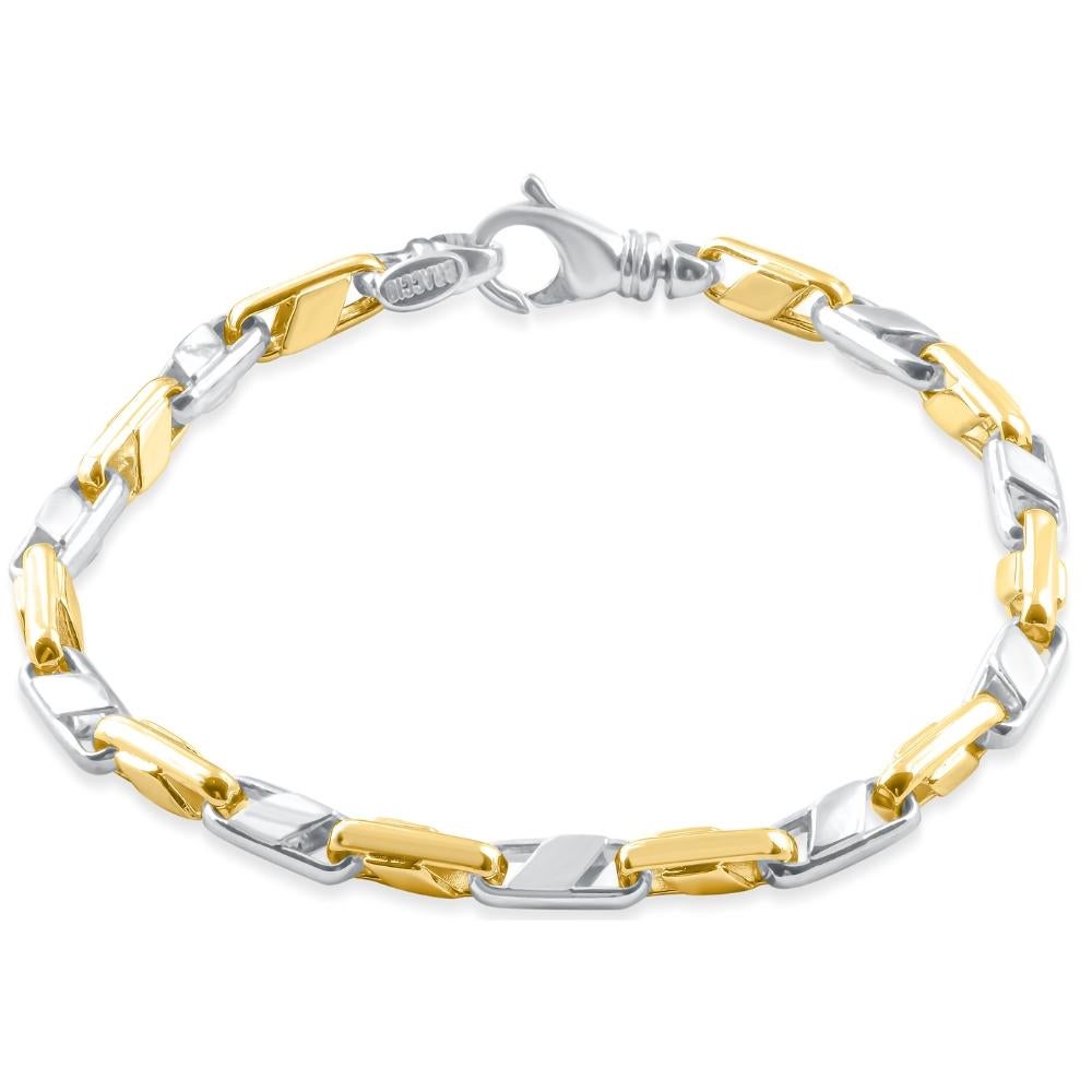 This stunning men's bracelet is made of solid 14k yellow/white gold.  The bracelet weighs 22 grams and measures 8