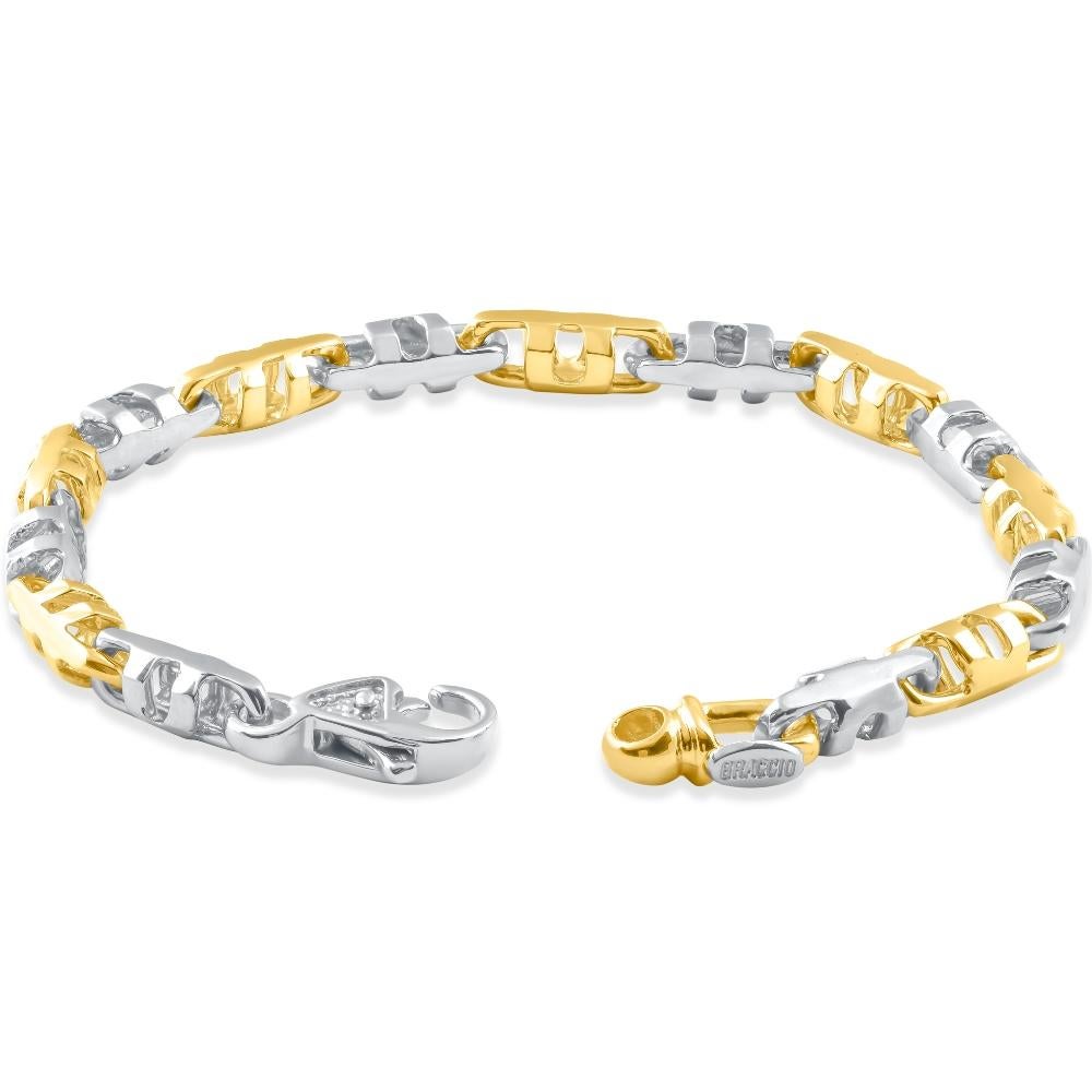 This stunning men's bracelet is made of solid 14k yellow/white gold.  The bracelet weighs 28 grams and measures 8