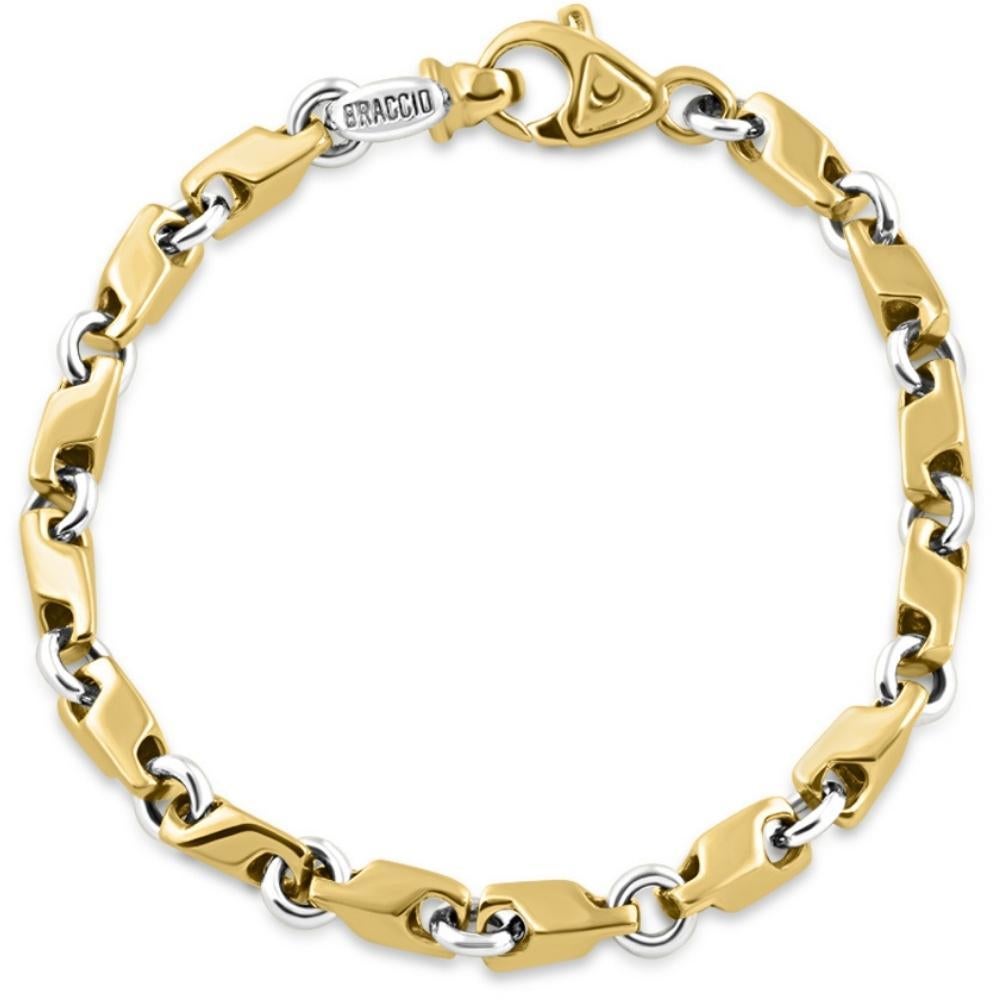 This stunning men's bracelet is made of solid 14k yellow/white gold.  The bracelet weighs 36 grams and measures 8