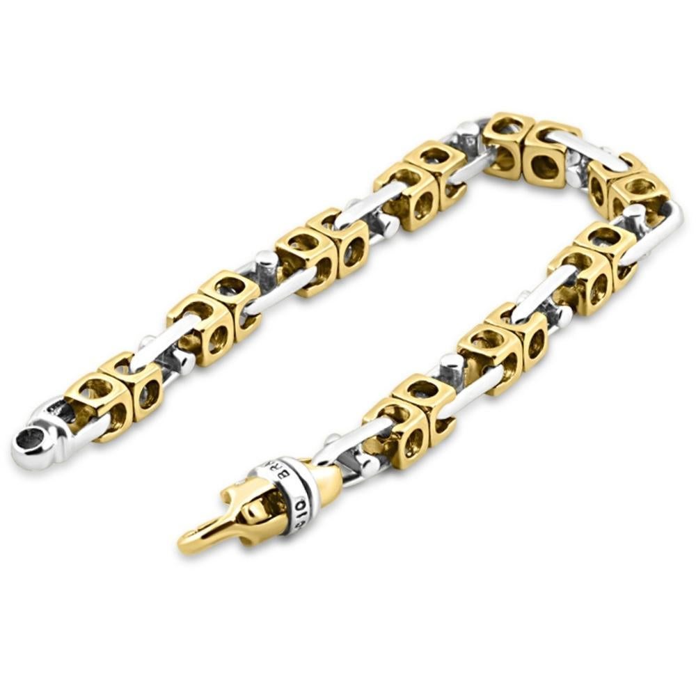 This stunning men's bracelet is made of solid 14k yellow/white gold.  The bracelet weighs 48 grams and measures 8.5