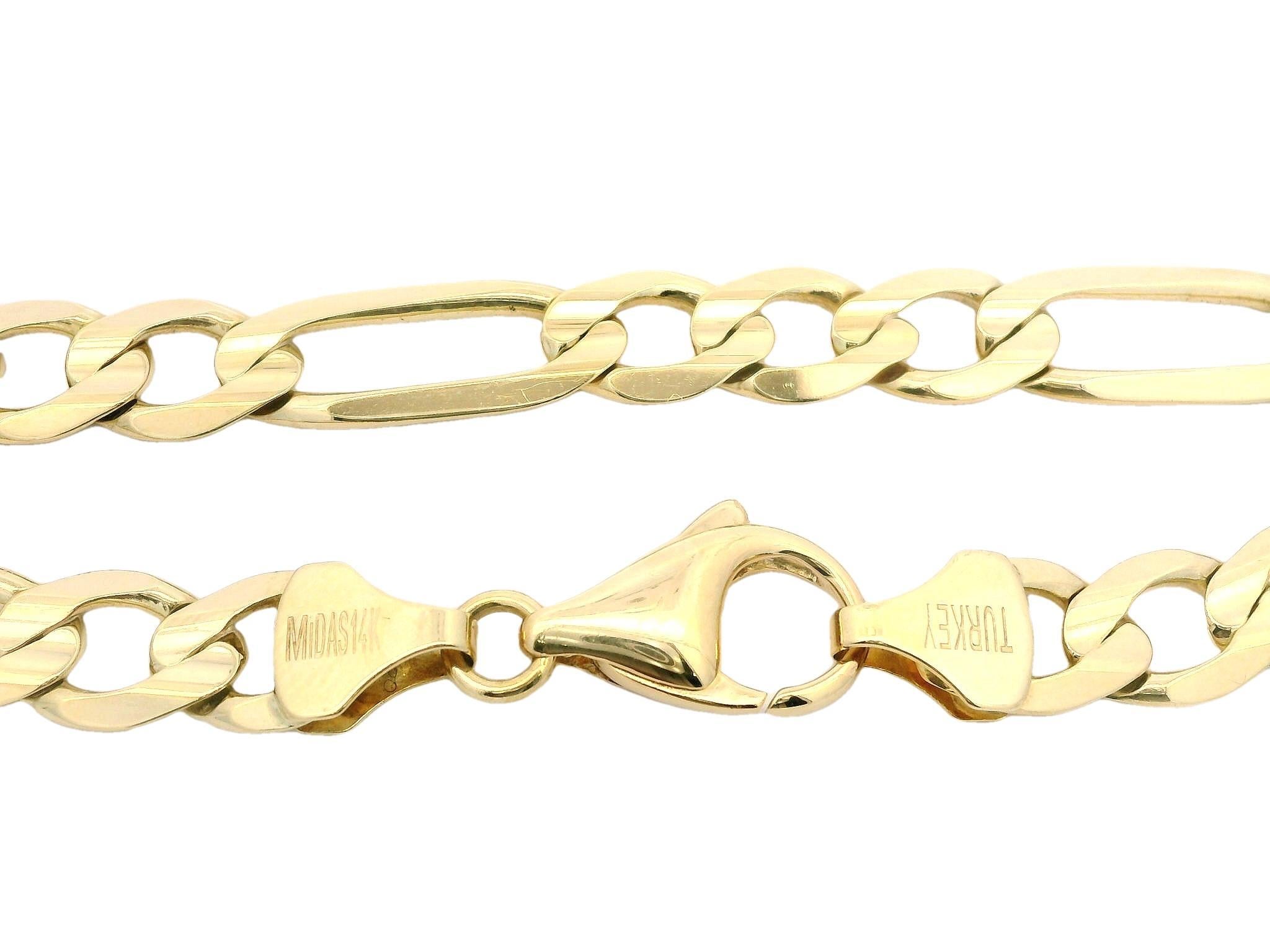 Material: Solid 14k Yellow Gold
Weight: 13.23 Grams
Type: Figaro Link
Length: Will Comfortably Fit up to a 8.5 Inch Wrist (measured next to a ruler)
Clasp: Lobster Claw Clasp
Width: 7.2mm
Thickness: 1.4mm rise off the wrist
Stamp: Turkey - Midas -