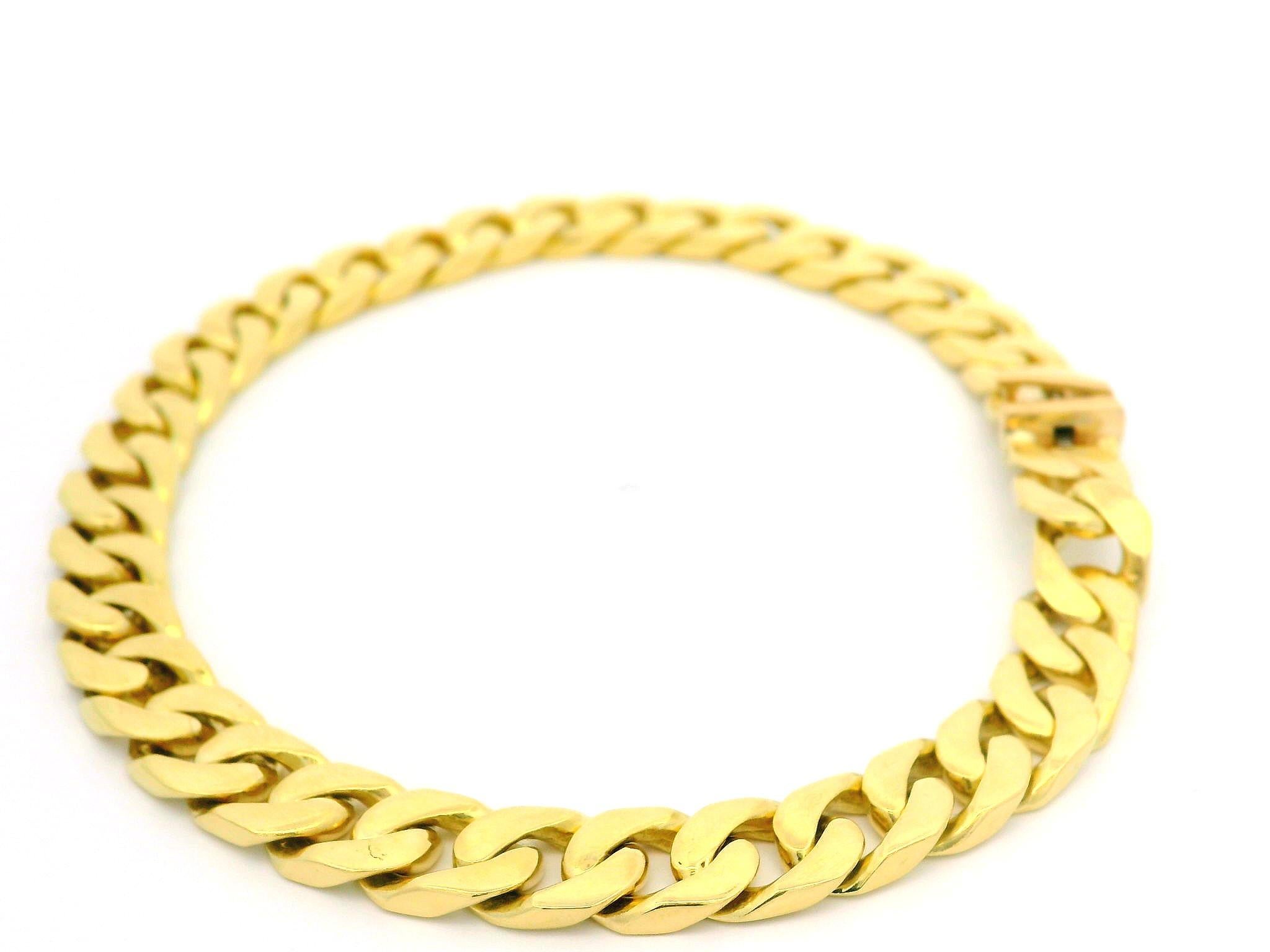 Material: Solid 18k Yellow Gold
Weight: 38.05 Grams
Chain Type: Flat Curb/Cuban Link
Chain Length: Measures 8.5 Inches Next to a Ruler. Will comfortably fit up to a 8.25 inch wrist (fitted on a wrist)
Chain Width: 7.7mm
Chain Thickness: 2.2mm rise