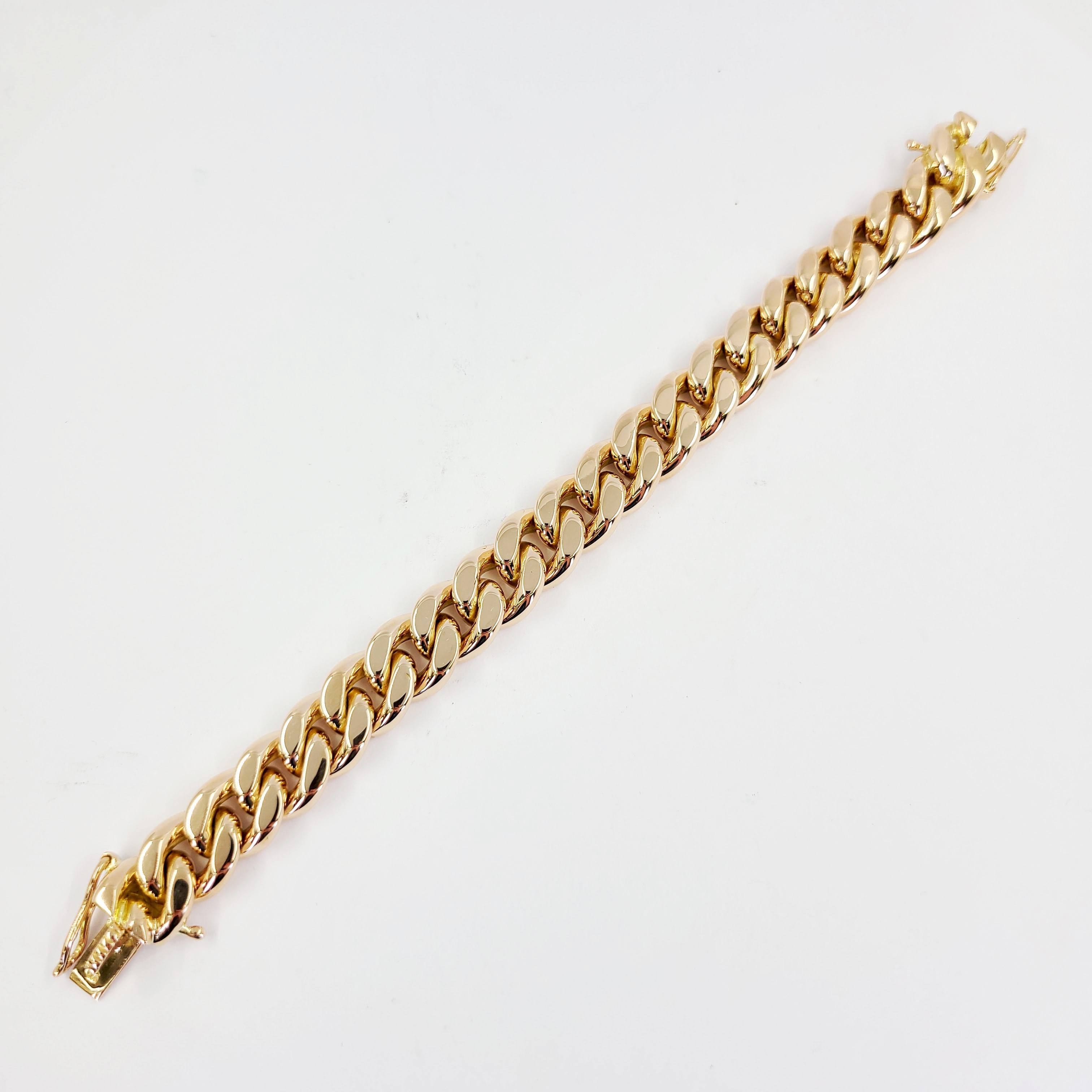 18 Karat Rose Gold 14mm Solid Cuban Link Chain Bracelet Measuring 8 Inches Long. Finished Weight Is 183.5 Grams. Box Clasp With Two Figure 8 Safety Clasps.