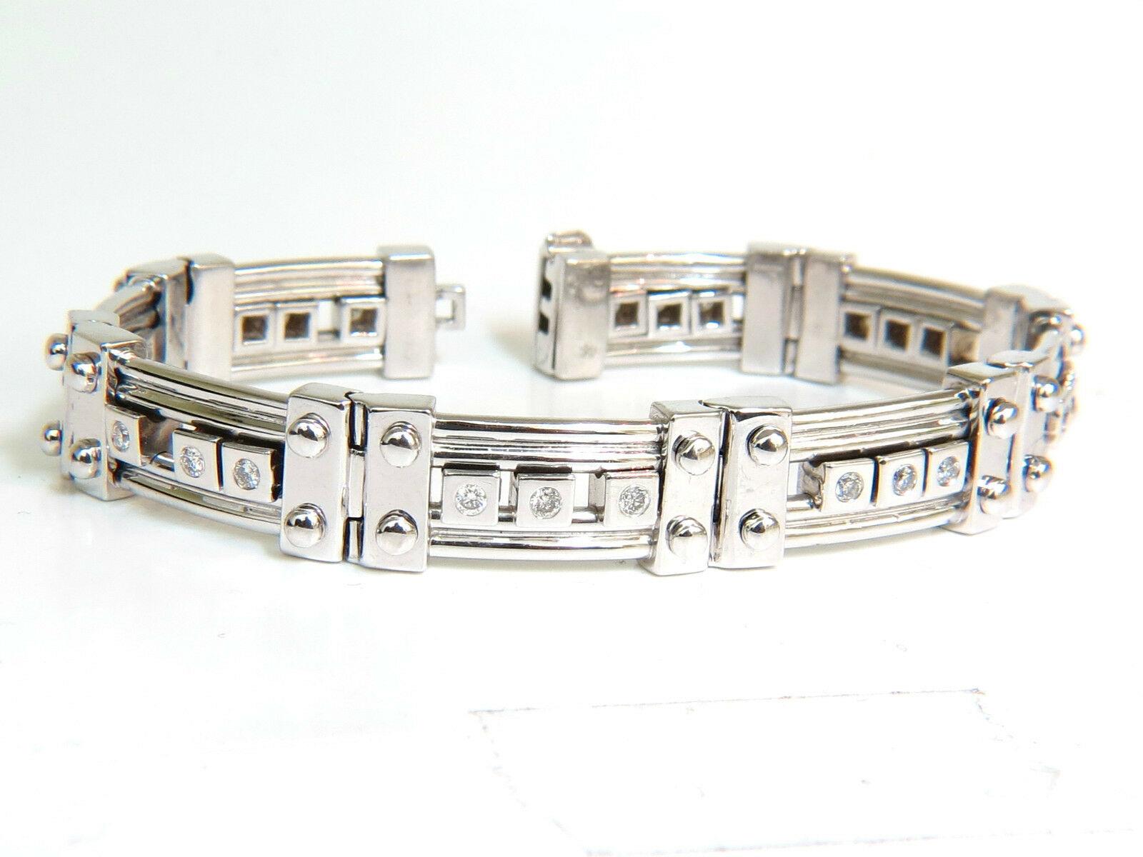 The Metallic Power.

Sliding diamond boxes

Heavy & solid.

Made for the Biker or Goth Deco.

1.40ct. Natural Diamonds

H / color

Si-1 clarity.

Rounds, full cuts.

14kt. White gold.

69.3 Grams.

8 Inches long

12.4 mm wide

Depth: 5.1mm

Secure