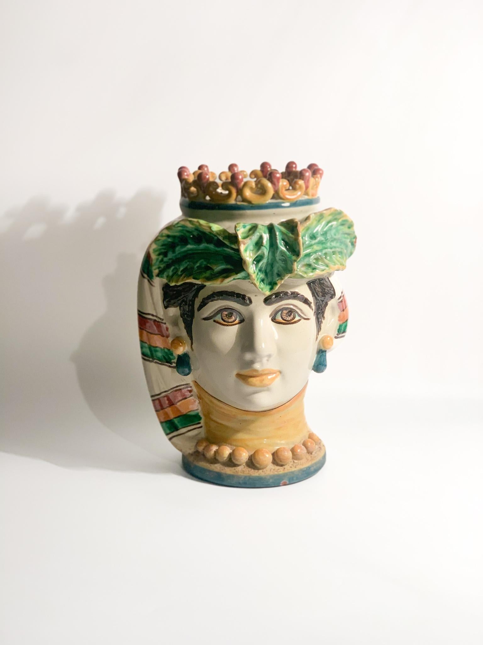 Moor's head in Caltagirone ceramic of a male figure, created by Giacomo Alessi in the 1990s

Ø cm 20 h cm 29

Giacomo Alessi is an Italian master ceramist born in Caltagirone, Sicily, in 1957. He is one of the few registered Sicilian masters in the