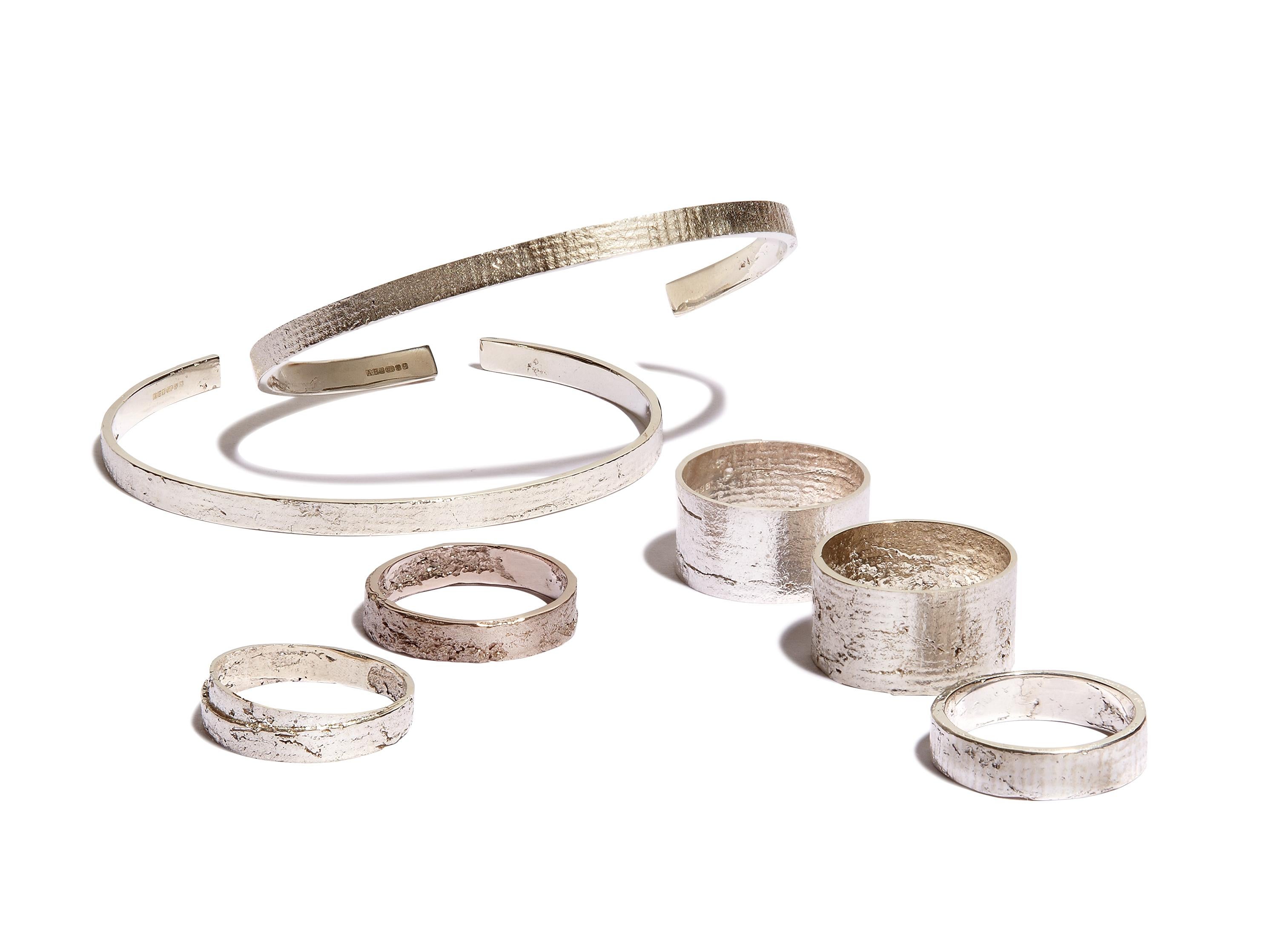 This solid platinum textured men's band ring measures approximately 5mm wide.  
Every piece in Allison Bryan's Paper collection is individually hand-crafted in paper and cast directly into precious metal in a unique and innovative process.  Every
