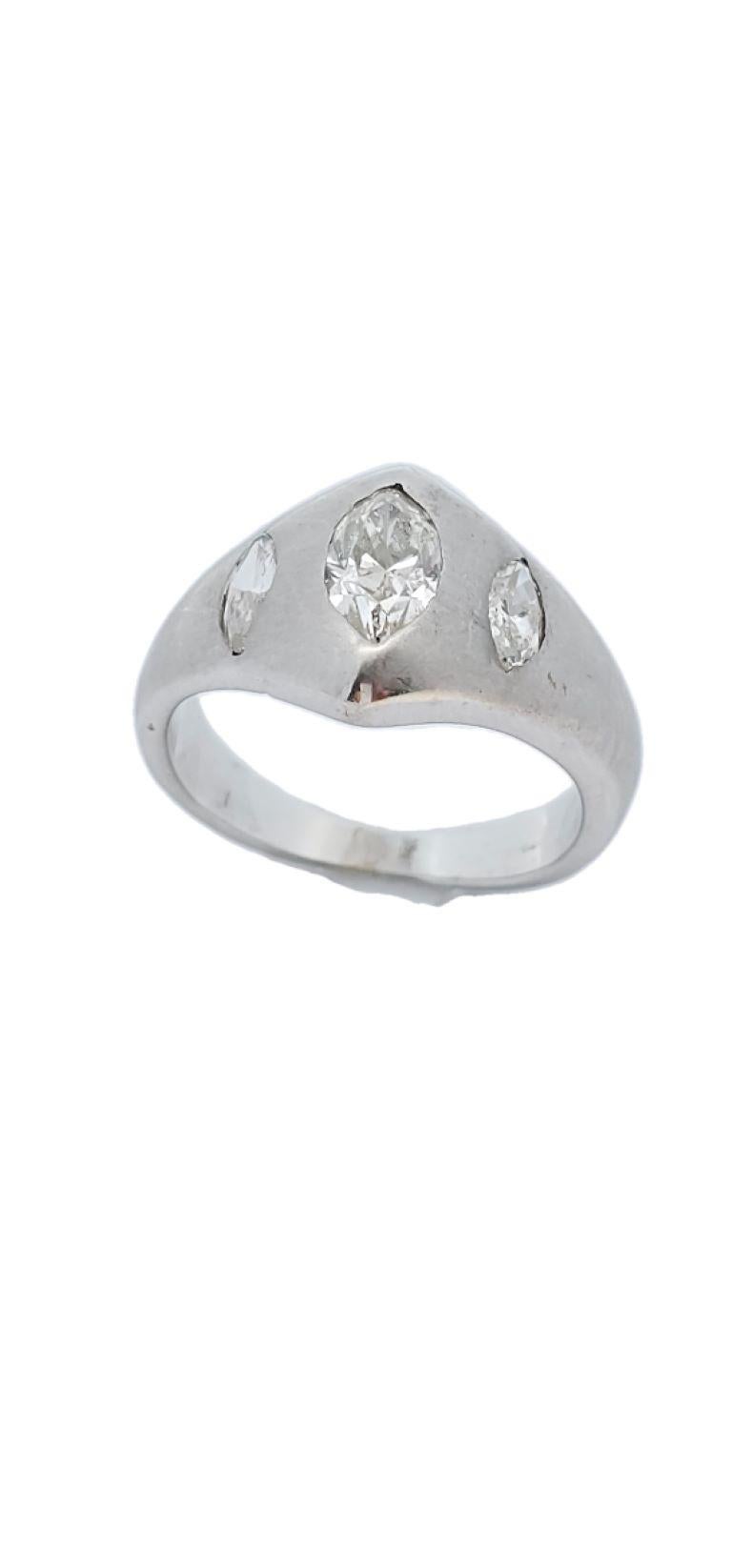  Men's Three Stone Marquise Cut Diamond Ring. A  diamond ring consisting of a center marquise with two small side marquise diamonds.

Center Diamond Weight: .45 carats

Side Diamond Weight: .35 carats 

Ring Size: 5 

Metal Type: 14 karat white gold