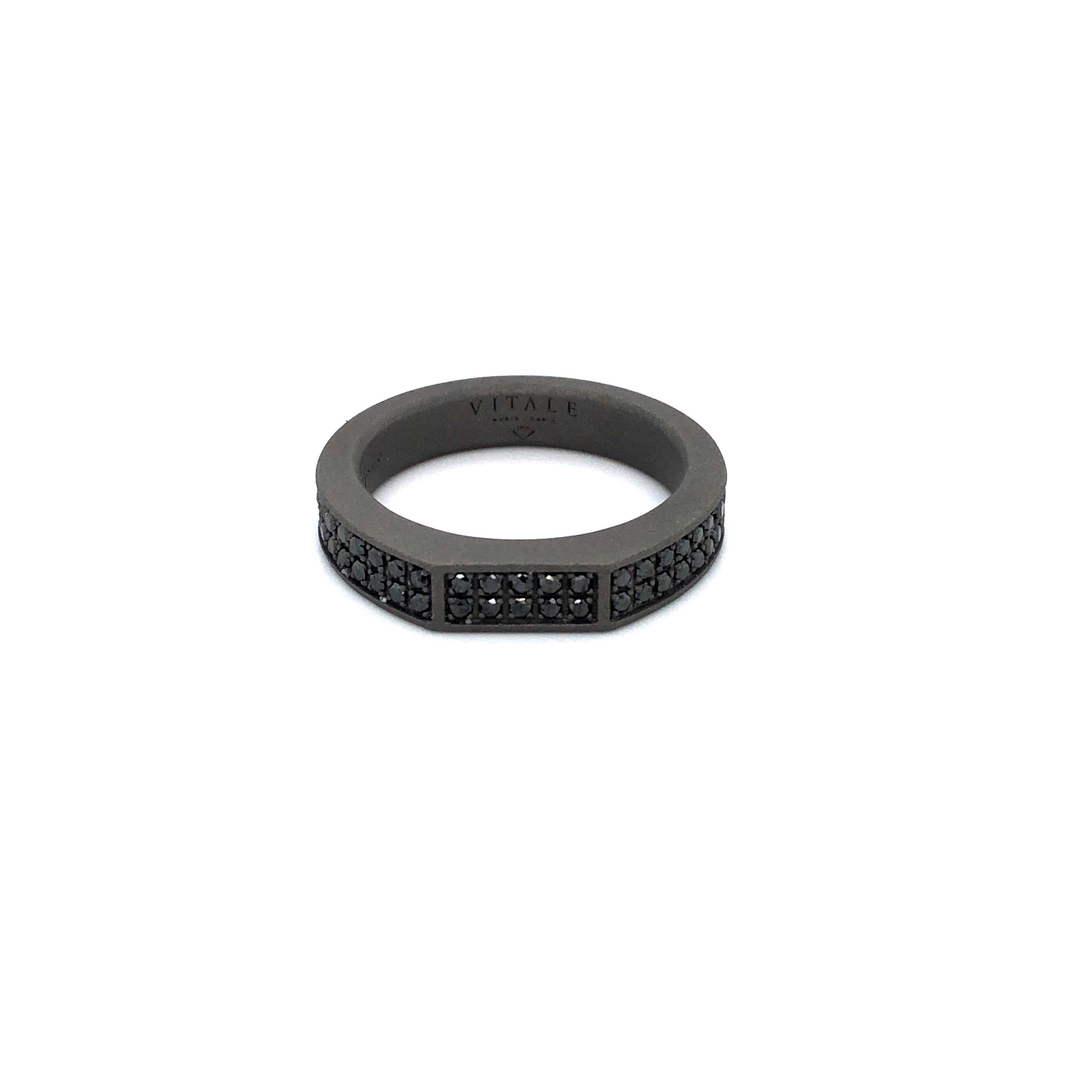 Titanium band ring is from our Men's Collection. This masculine stylish ring is made of 90 natural black round diamonds in total of 0.9 Carat that are placed along the band. The band is 0.5cm wide. Perfect for modern look!

The men’s collection is a