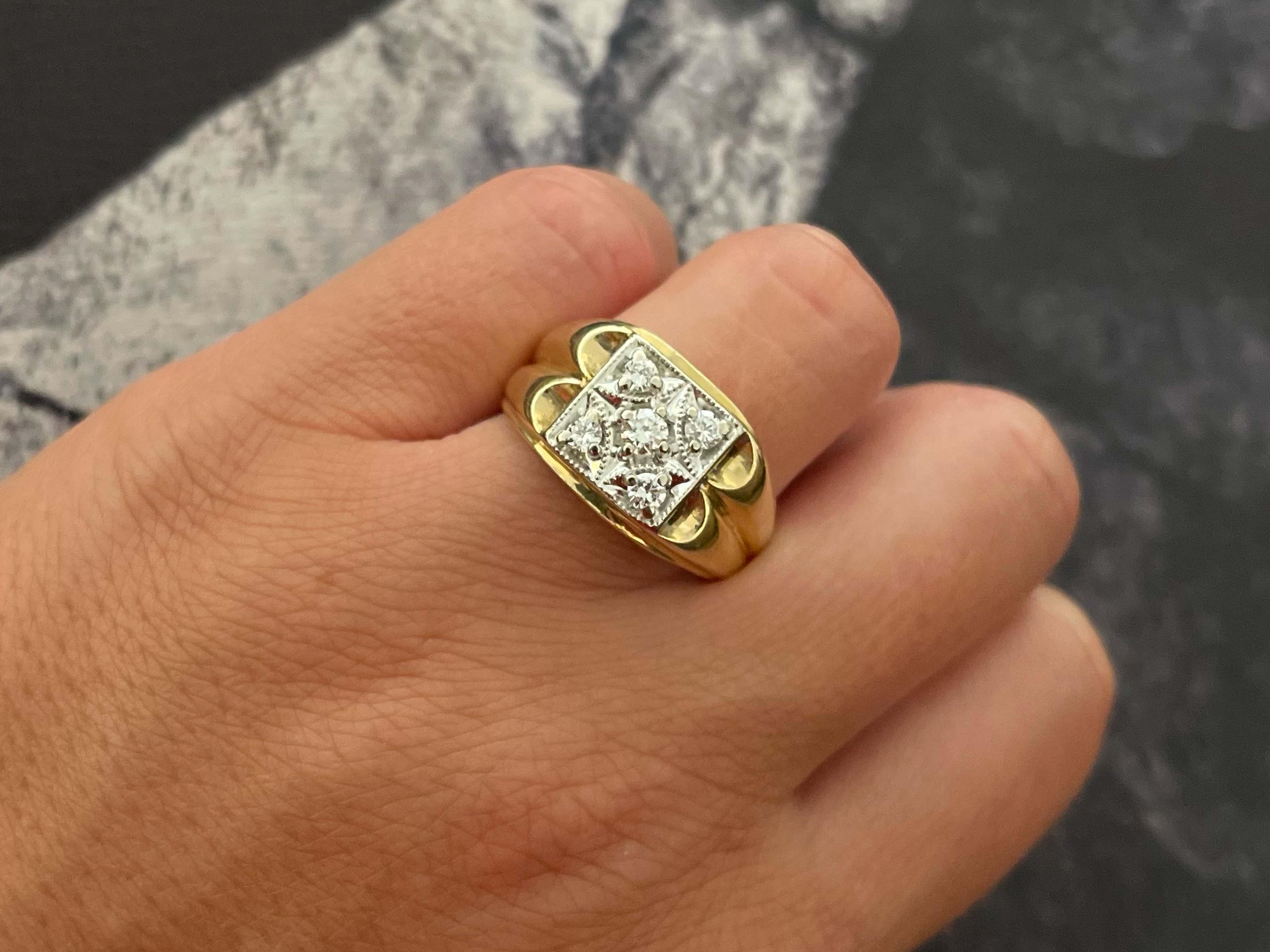 Item Specifications:

Metal: 14k Yellow and White Gold

Style: Statement Ring

Ring Size: 9.5 (resizing available for a fee)

Total Weight: 8.1 Grams

Gemstone Specifications: 5 Diamonds

Diamond Carat Weight: 0.42 carats

Diamond Color: G

Diamond