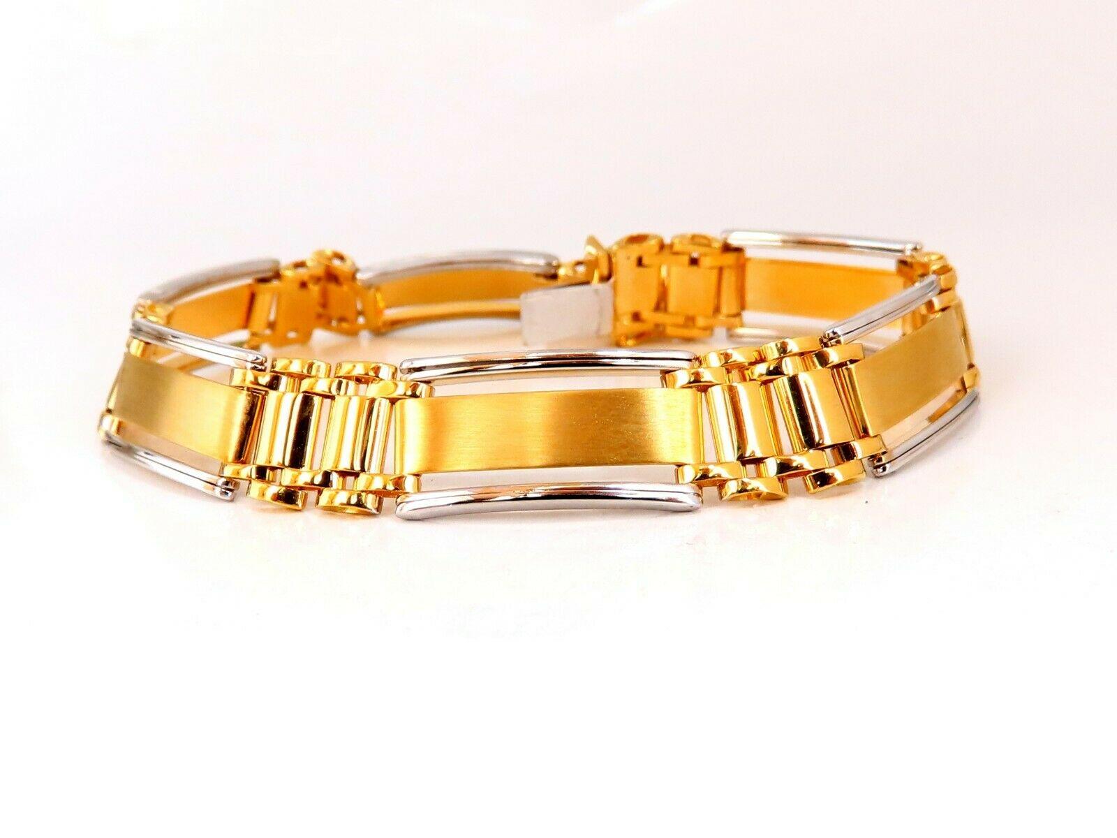 Mens Modern Brush & Hinge Link Bracelet

Durable, Well Made

For 8 inch wrist.

10mm wide

14kt. yellow / white gold 

20.8 Grams.