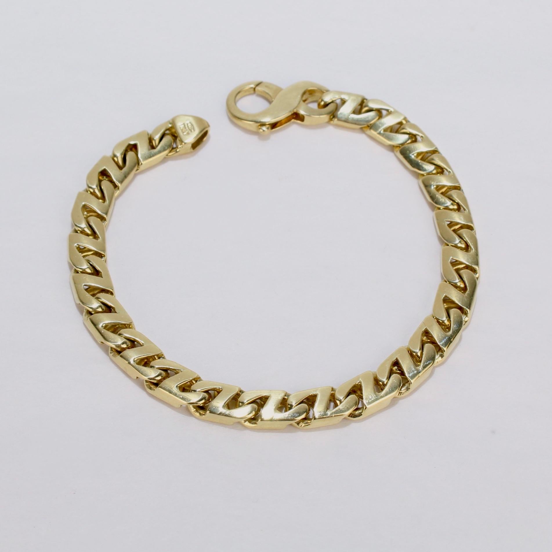 A vey fine Tiffany and Company 18k gold men's bracelet. 

The links are a heavy curb chain variant, and the bracelet is secured with a lobster claw clasp.

Circa 1980.

Marked to clasp with the T & Co. mark for Tiffany, 750 for 18k gold fineness,