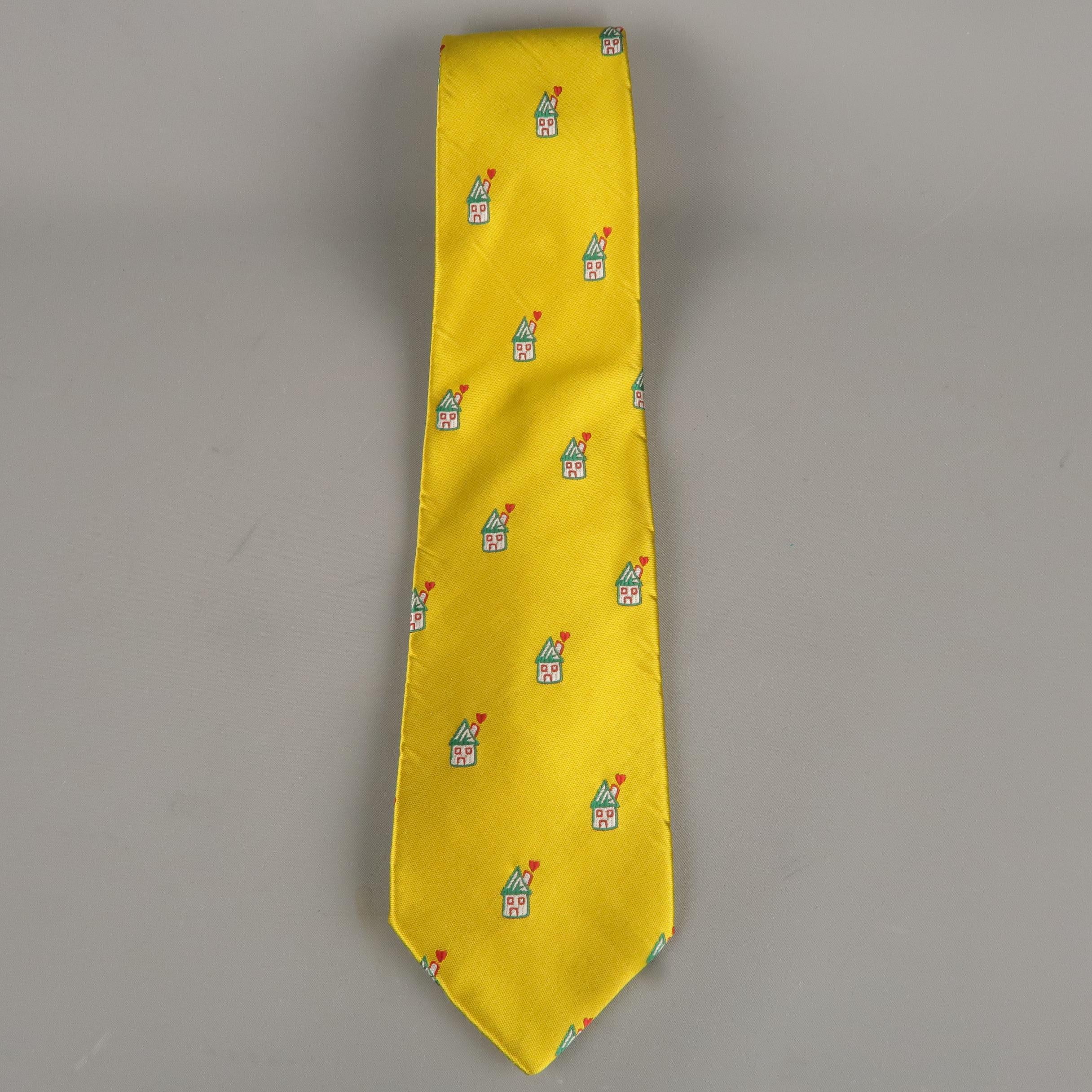 Vintage MOSCHINO tie comes in yellow gold silk satin with an all over green and red heart house print. Made in Italy.
 
Very Good Pre-Owned Condition.
 
Width: 3.60 in.