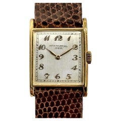 Herrenuhr Vintage Rectangular Patek Philippe 18K Gold mit braunem Eidechsenarmband