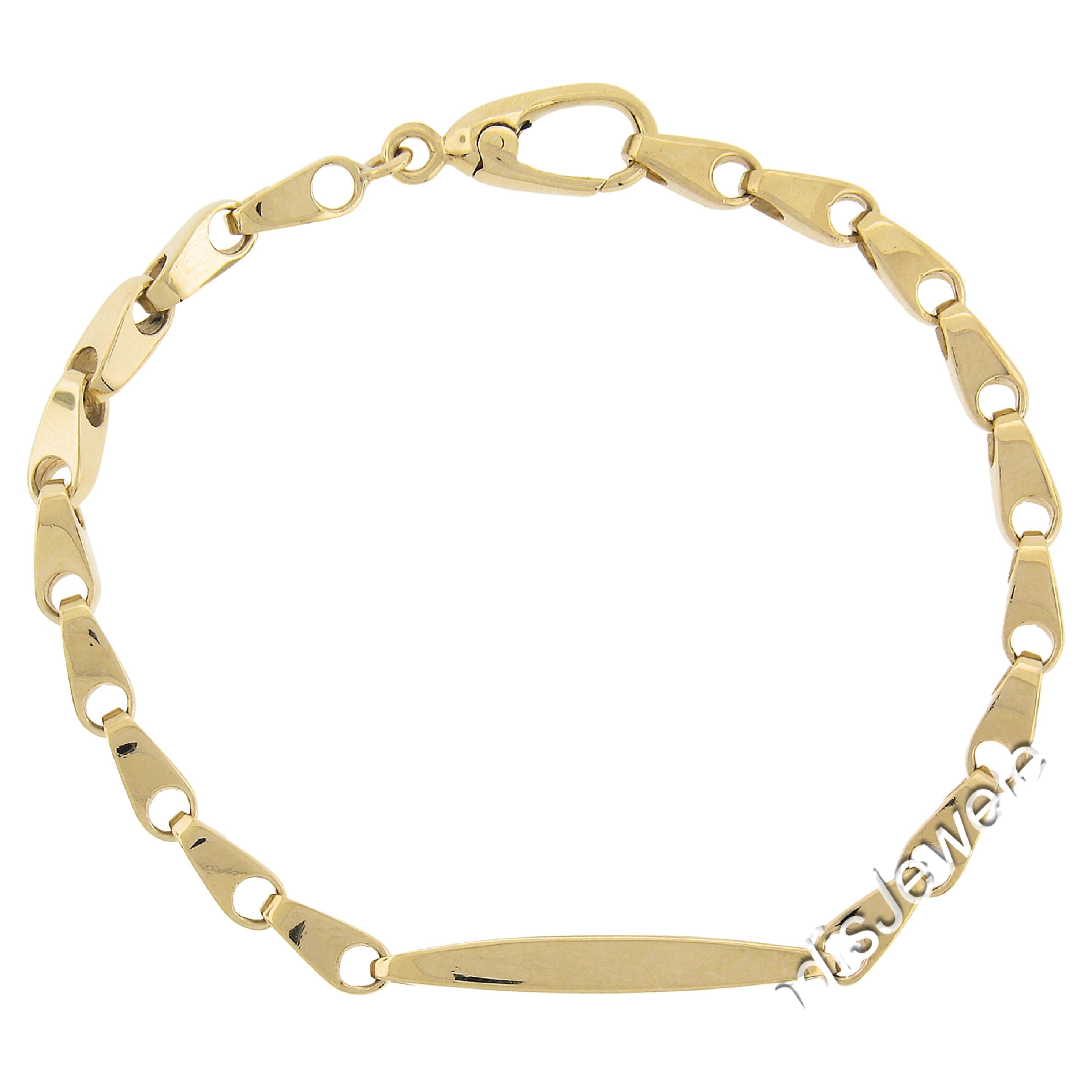 Bracelet d
homme en or jaune 7", finition polie, chaîne d
identification géométrique 3D en vente