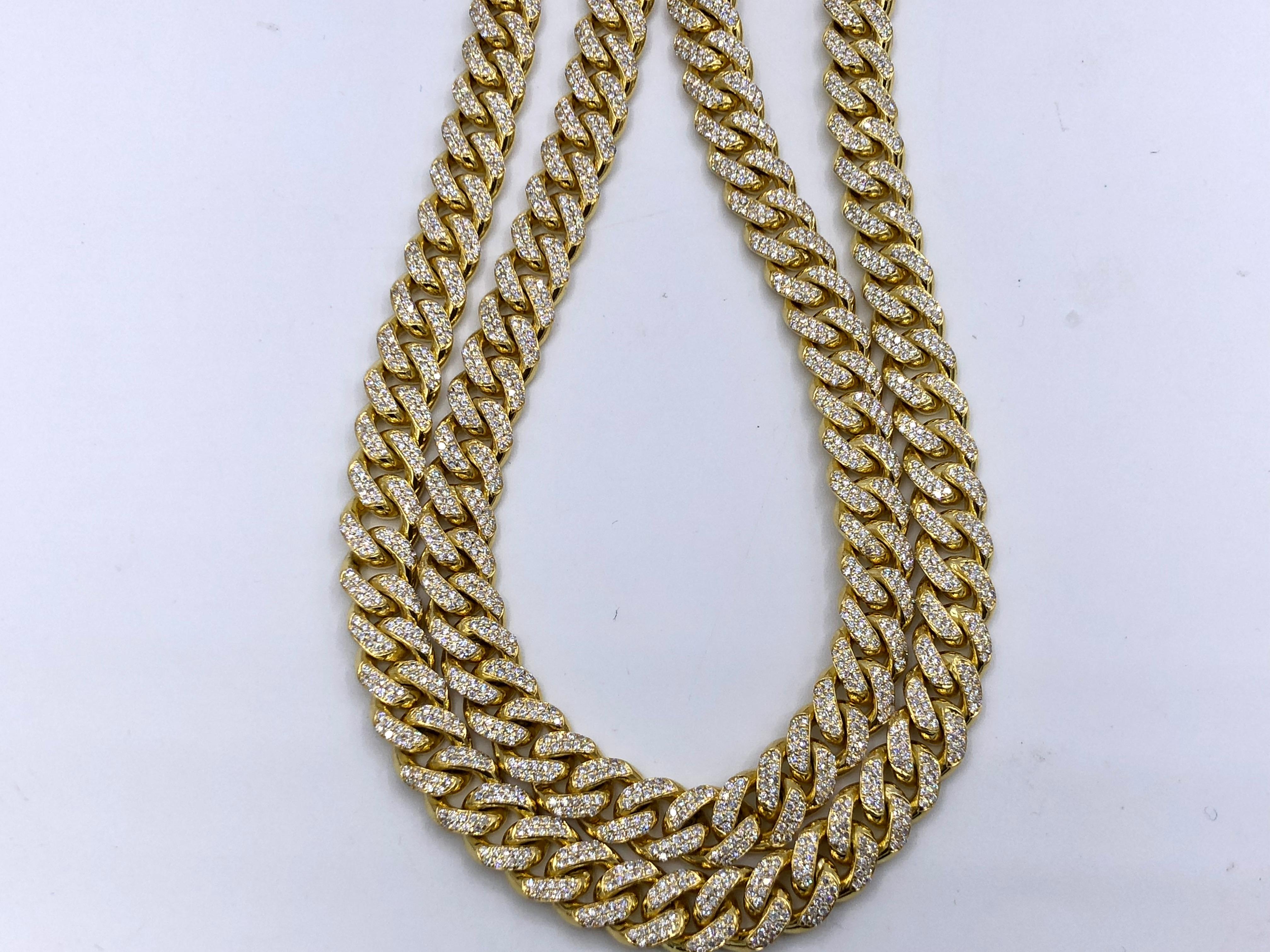 14KT yellow gold diamond Cuban link chain with 13.50 ct total weight of pave diamonds

This product comes with a certificate of appraisal
This product will be packaged in a custom box

Composition:
14K yellow gold
13.50 cts white diamonds
Length: