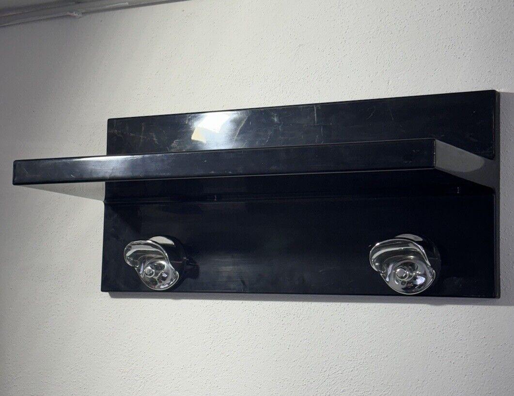 Kartell Marcello Siard und Olaf von Bohr 70er-Jahre-Vintage-Garderobe.

Struktur ganz aus schwarzem Kunststoff, silberfarbene Haken.

Der Artikel ist in einem guten konservativen Zustand, es sind keine ästhetischen oder strukturellen Mängel zu