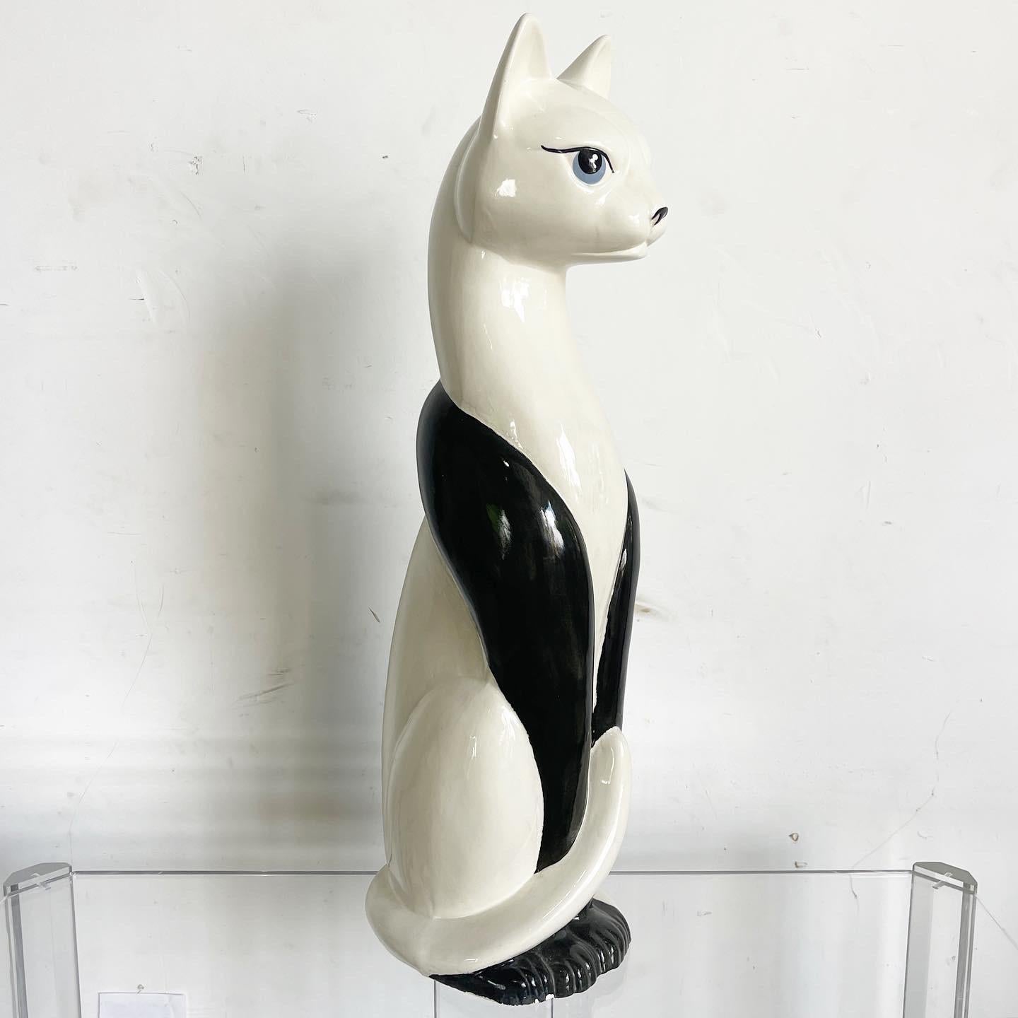 white ceramic cat statue