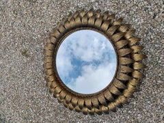 Meral sunburst mirror with wall-light