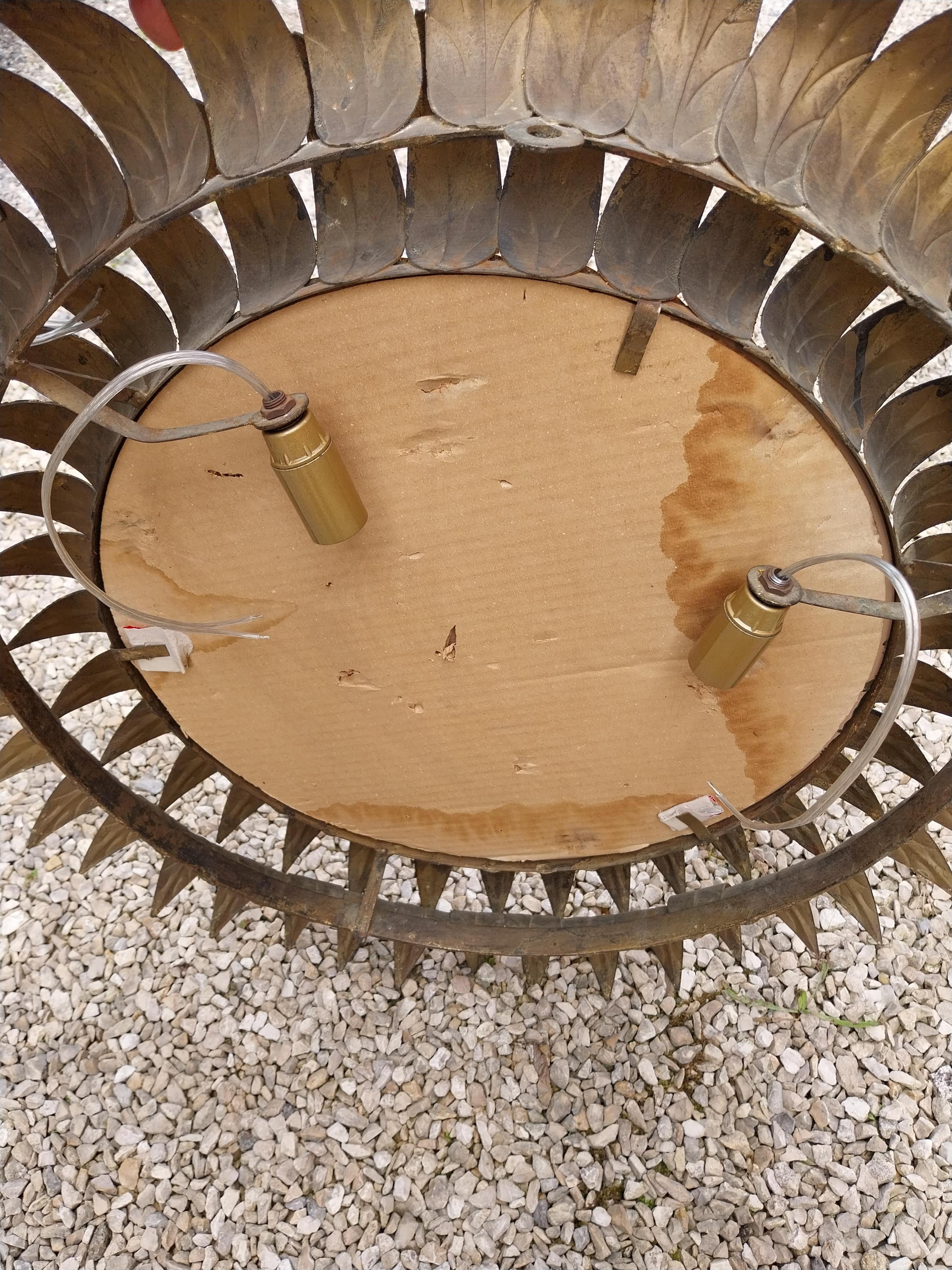 Glass Meral sunburst mirror with wall-light For Sale