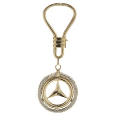 Anello portachiavi Mercedes in oro giallo e bianco 18 carati