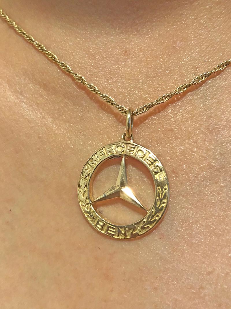 gold mercedes benz pendant