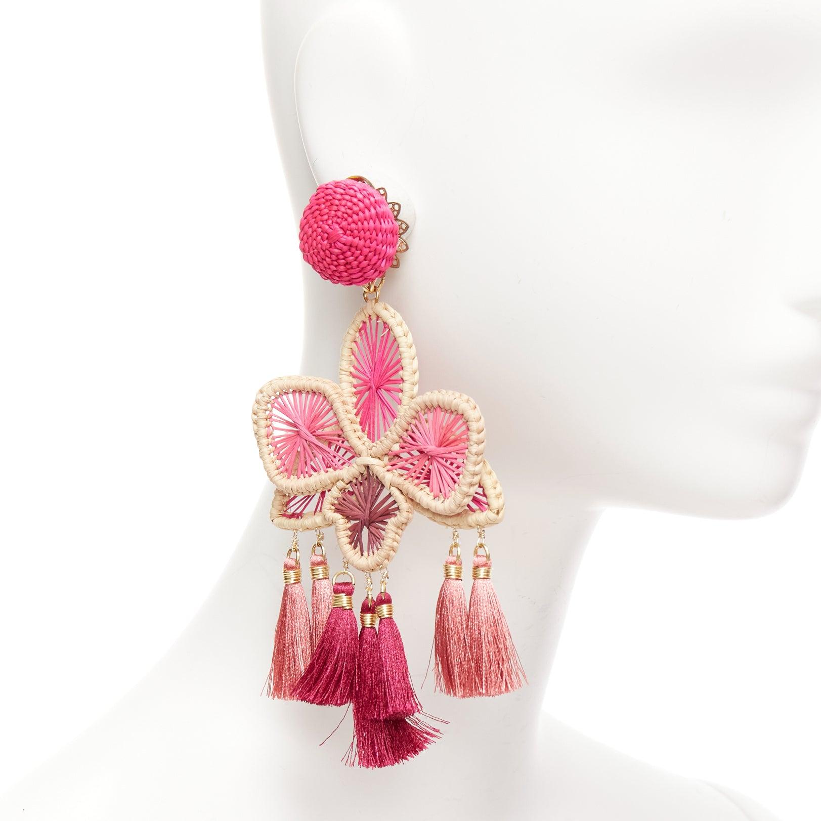 MERCEDES SALAZAR hot pink raffia red tassel dangling clip on earrings Pair
Reference: AAWC/A01261
Brand: Mercedes Salazar
Material: Metal, Raffia
Color: Multicolour, Pink
Pattern: Floral
Closure: Clip On
Extra Details: Raffia