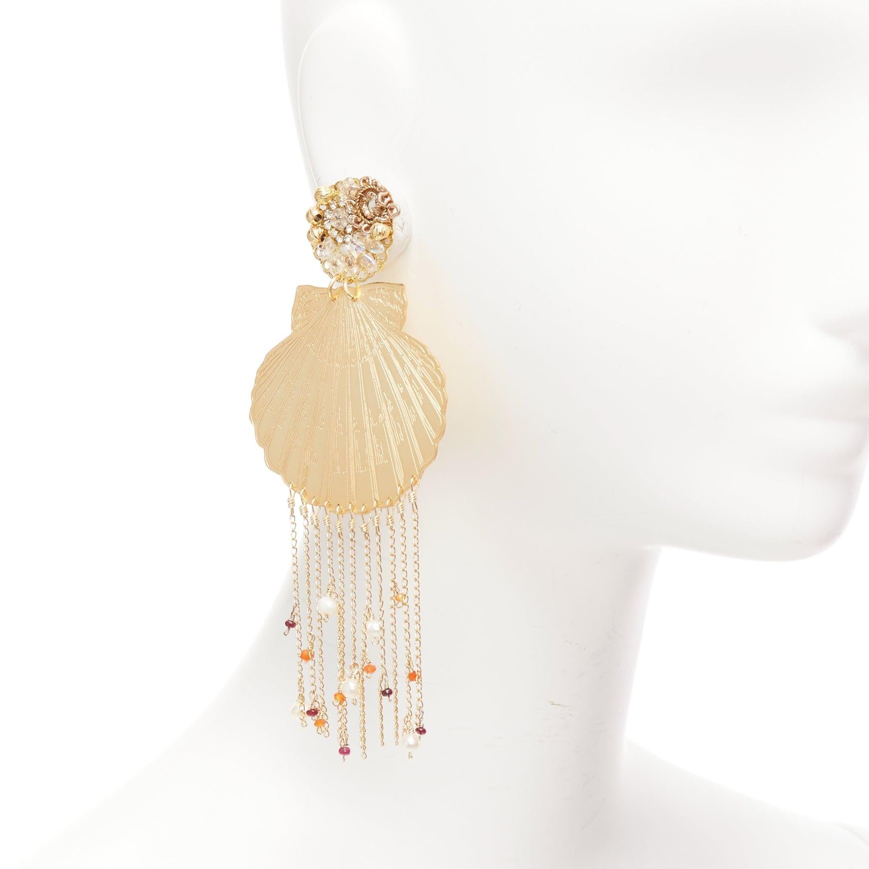 MERCEDES SALAZAR gold metal shell crystal faux pearl tassel clip on earrings Pair
Reference: AAWC/A01225
Brand: Mercedes Salazar
Material: Metal, Faux Pearl
Color: Gold, Multicolour
Pattern: Solid
Closure: Clip On
Extra Details: Gold metallic shell
