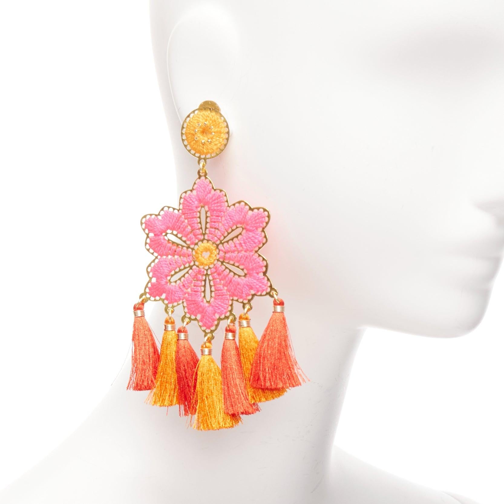 MERCEDES SALAZAR neon pink orange floral tassel gold clip on earrings
Reference: AAWC/A01247
Brand: Mercedes Salazar
Material: Metal, Fabric
Color: Neon Pink, Gold
Pattern: Solid
Closure: Clip On
Lining: Gold Metal
Extra Details: Logo at one of the