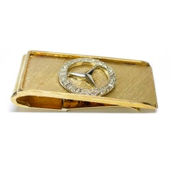 Fermasoldi con cerniera in oro giallo Mercedes