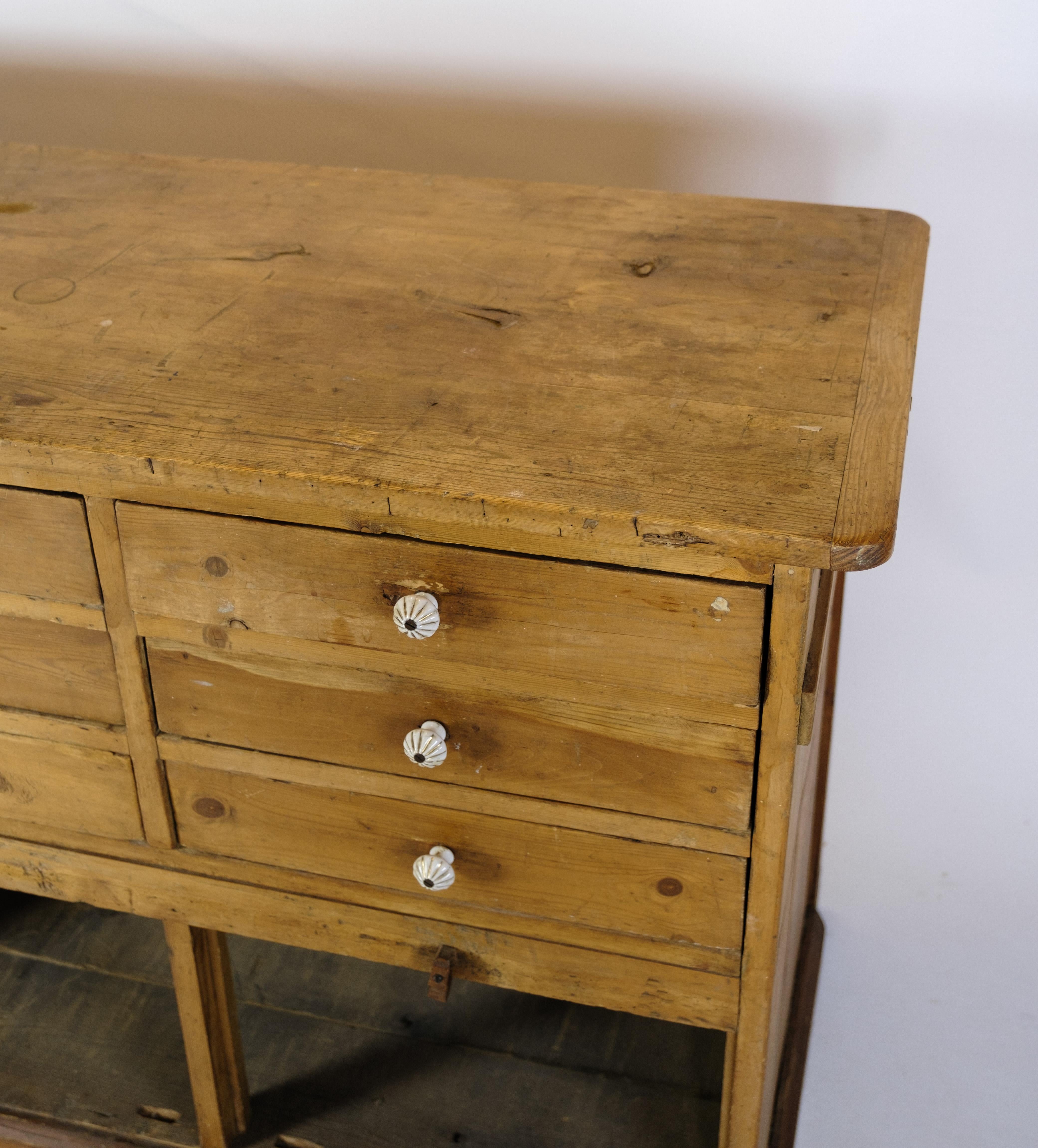 Merchant counter of Light pine in Patinated condition from the 1910 4