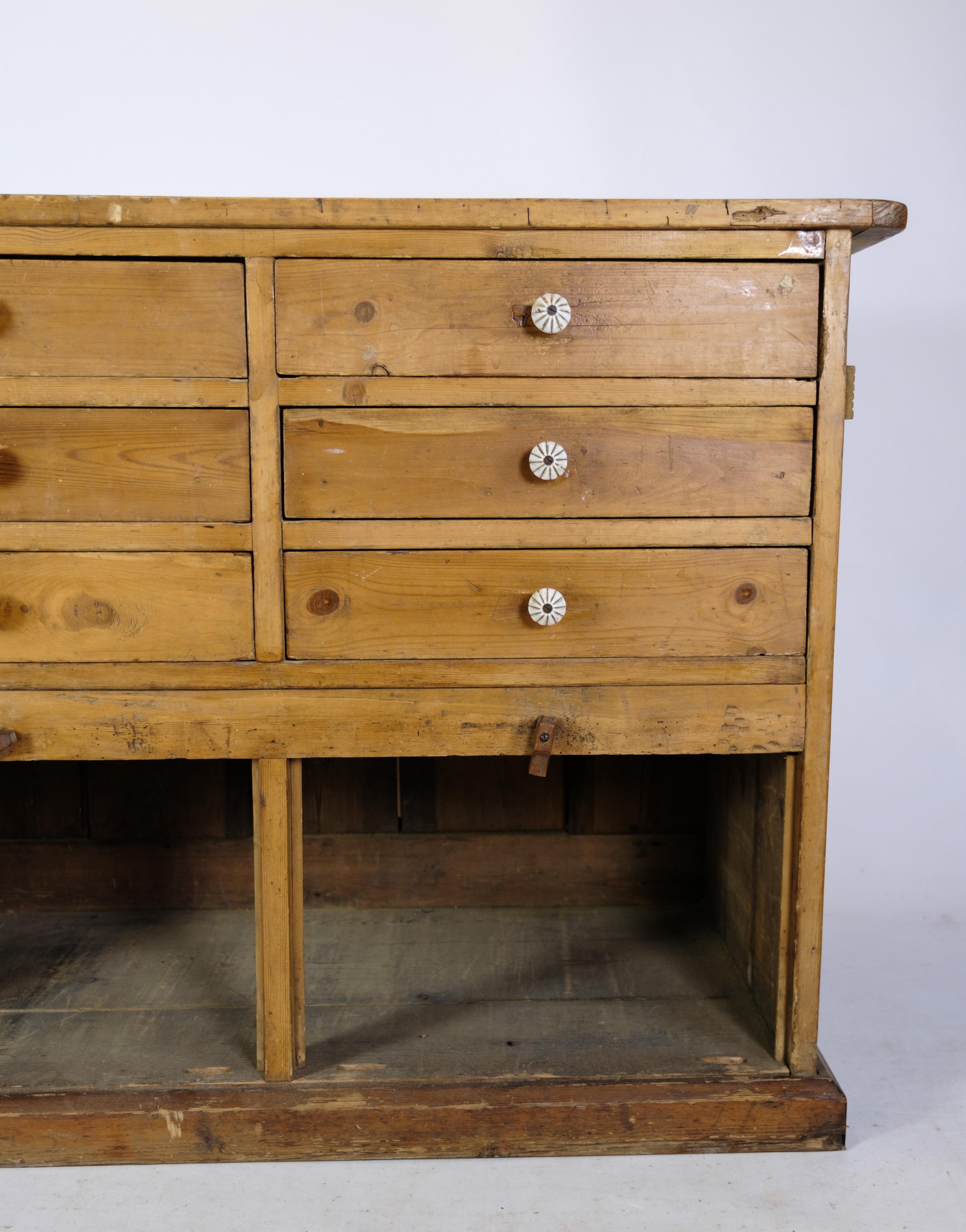 Merchant counter of Light pine in Patinated condition from the 1910 5