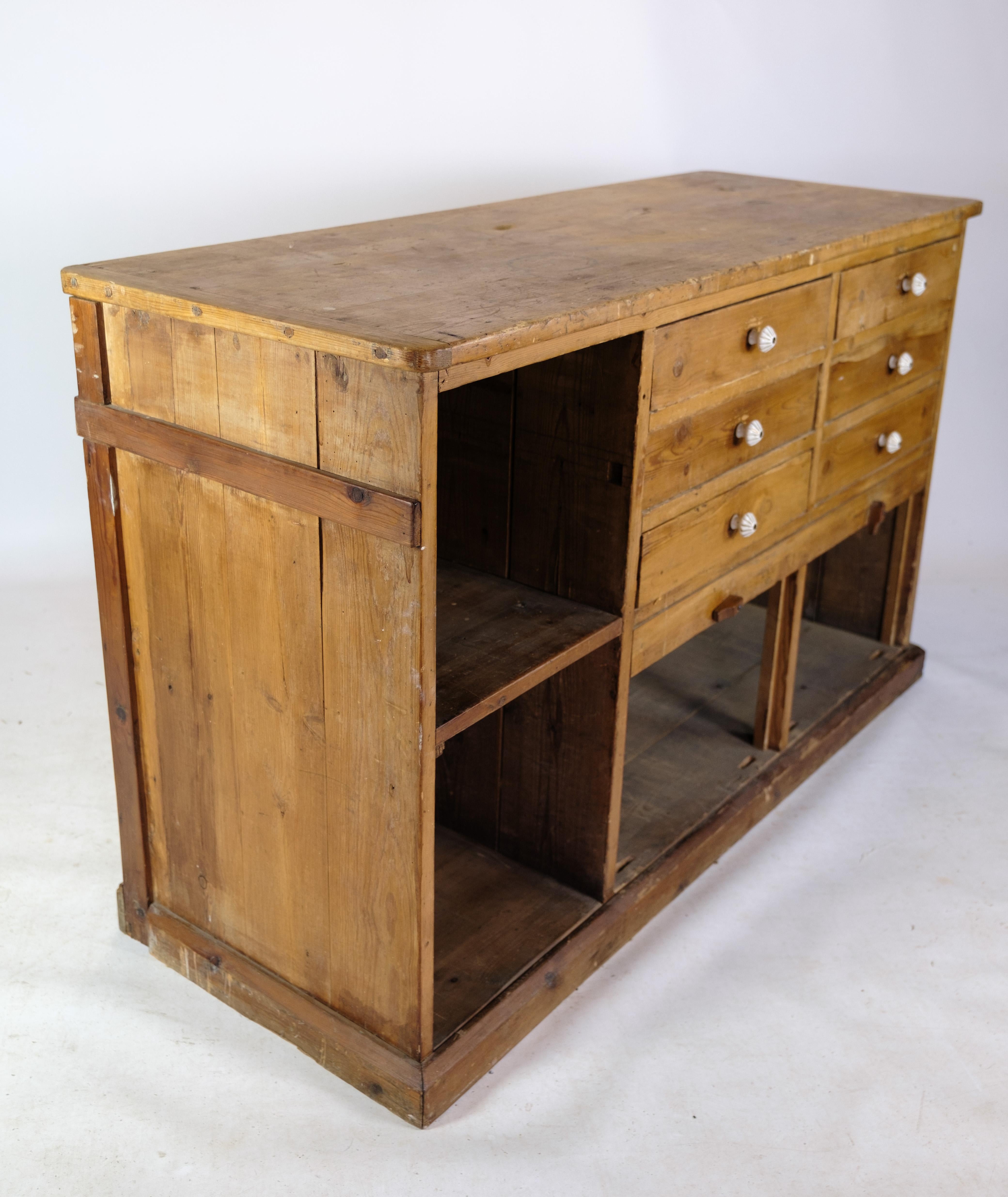 Merchant counter of Light pine in Patinated condition from the 1910 8
