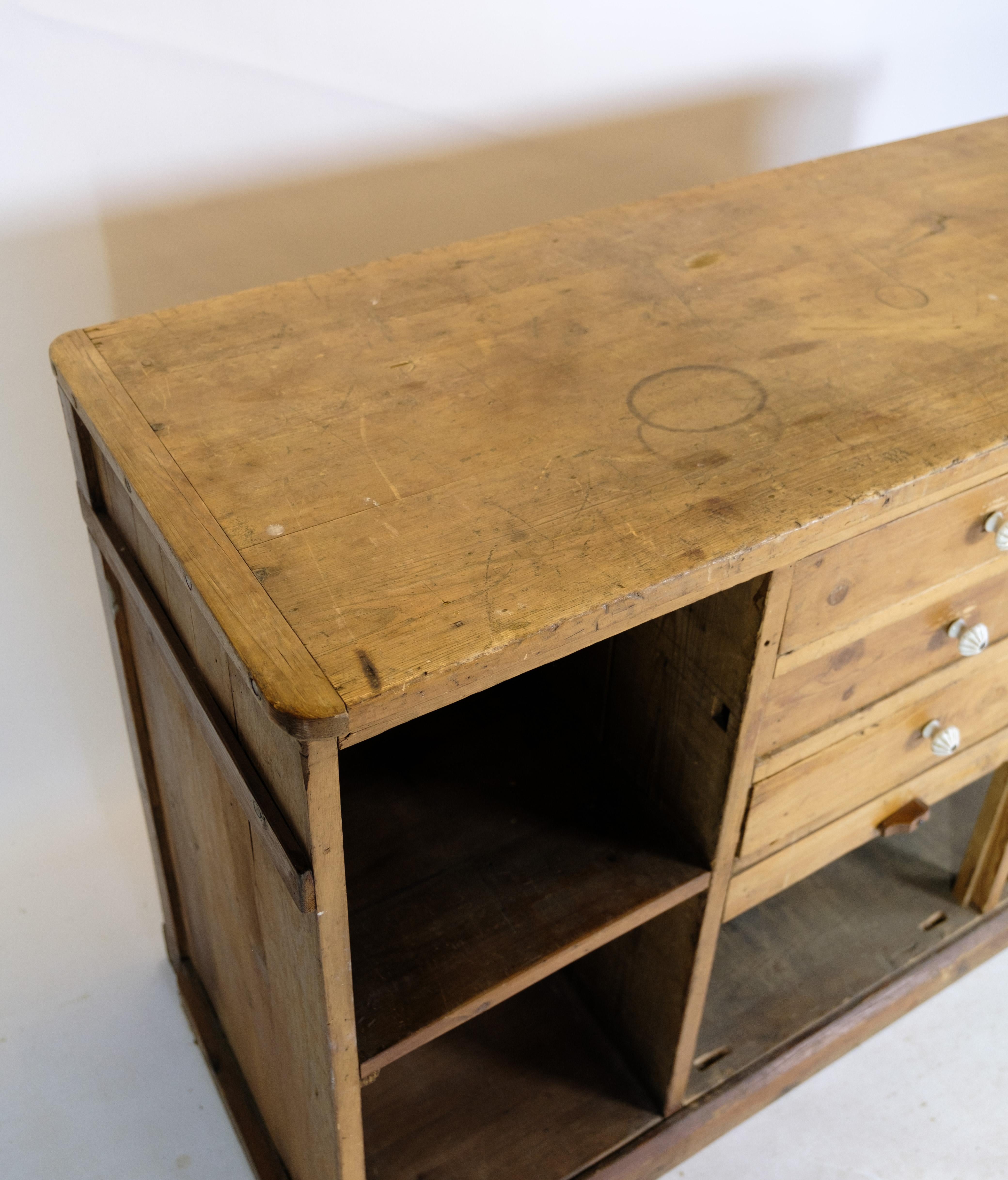 Merchant counter of Light pine in Patinated condition from the 1910 3