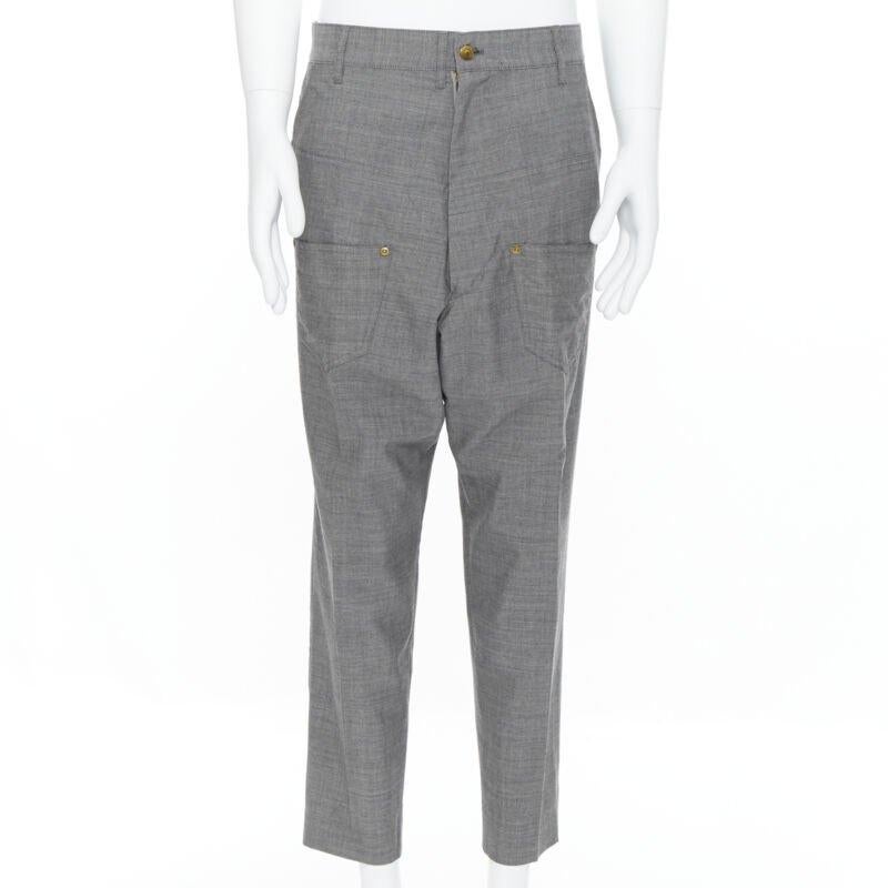 MERCIBEAUCOUP grey wool reversed back to front dropped crotch trousers JP3 L
Reference: CNLE/A00115
Brand: Mercibeaucoup
Model: Dropped crotch pants
Material: Wool
Color: Grey
Pattern: Solid
Closure: Zip
Extra Details: Back to front design dropped