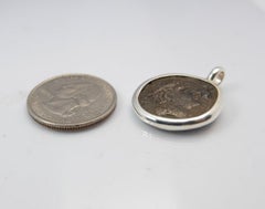 Mercury and Prow. Roman Republic.Rome, 217-215 BC. Æ Semuncia