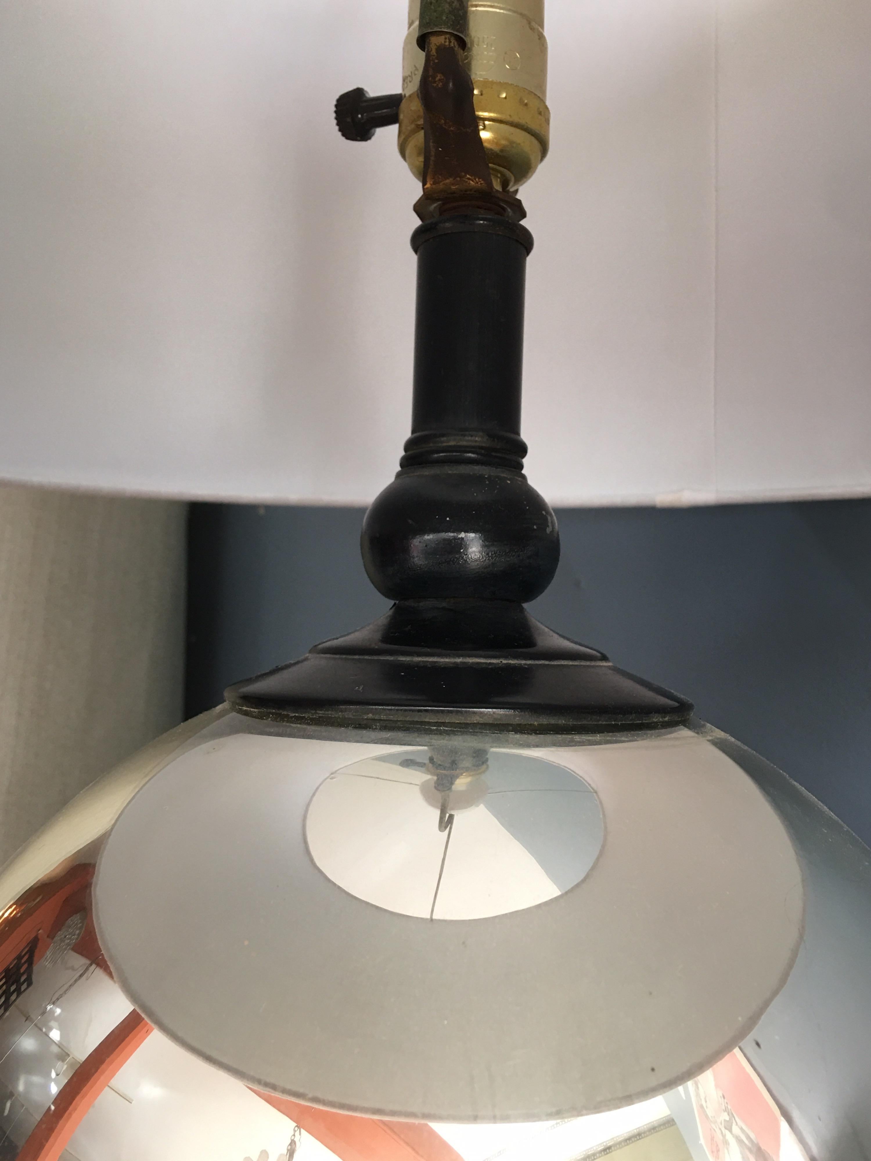 Mercury glass round ball table lamp. Nice size and classic shape. Has black metal base and neck fittings. Perfect to mix and match in both modern or traditional interiors!
