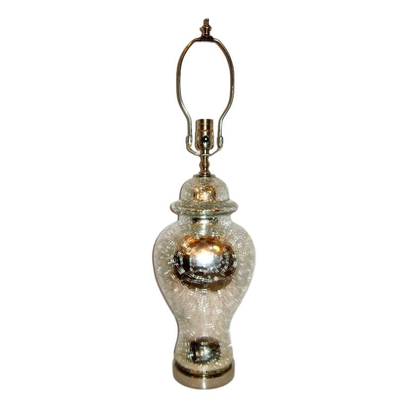 A circa 1930s French mercury crackle glass table lamp.

Measurements:
Height of body 16.5
