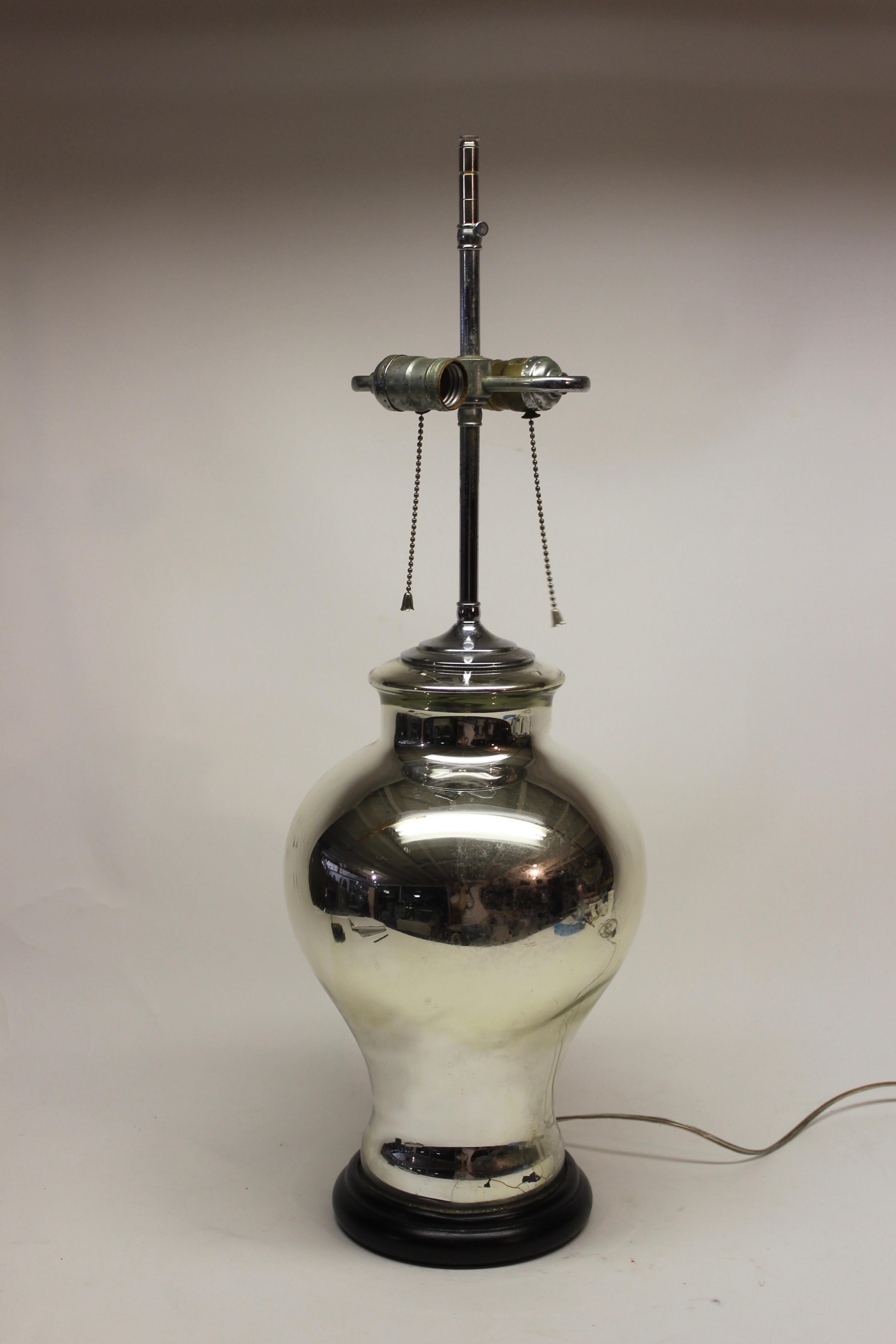 Mercury glass table lamp on ebonized wood basec

Lampshade, which is not included, measures 8.5