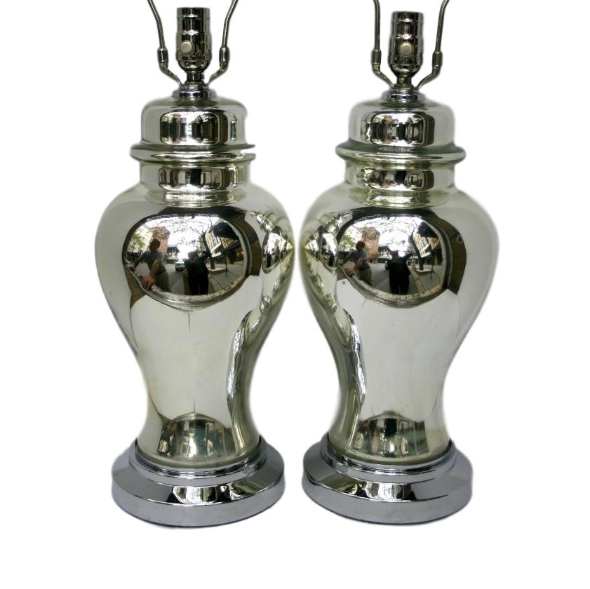 Pair of French circa 1930s mercury glass table lamps with nickel-plated bases.

Measurements:
Height of body 16.5