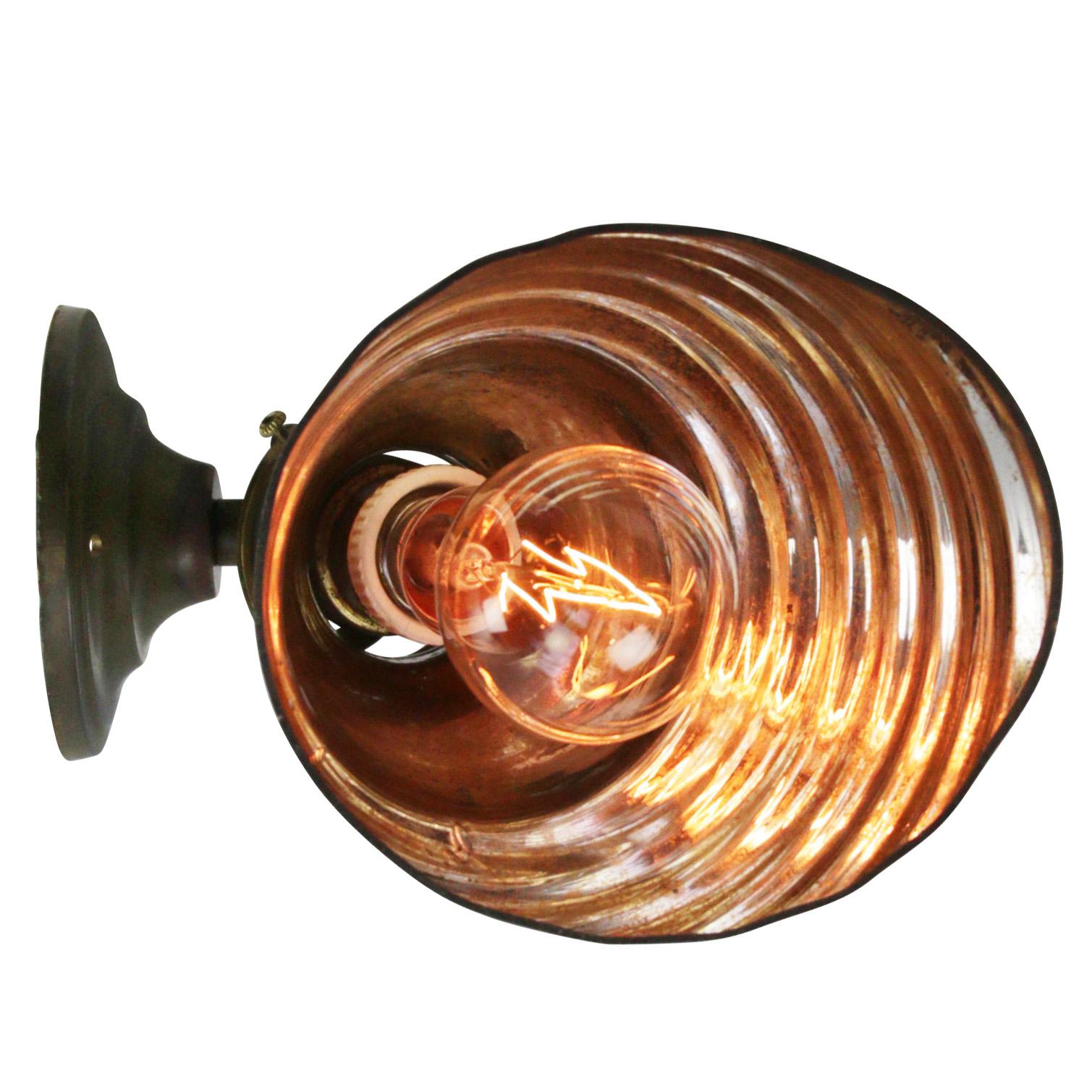 Mercury glass wall lamp
Metal base with mirror glass shade

Measures: Diameter wall mount 10 cm

Weight: 0.50 kg / 1.1 lb

Priced per individual item. All lamps have been made suitable by international standards for incandescent light bulbs,