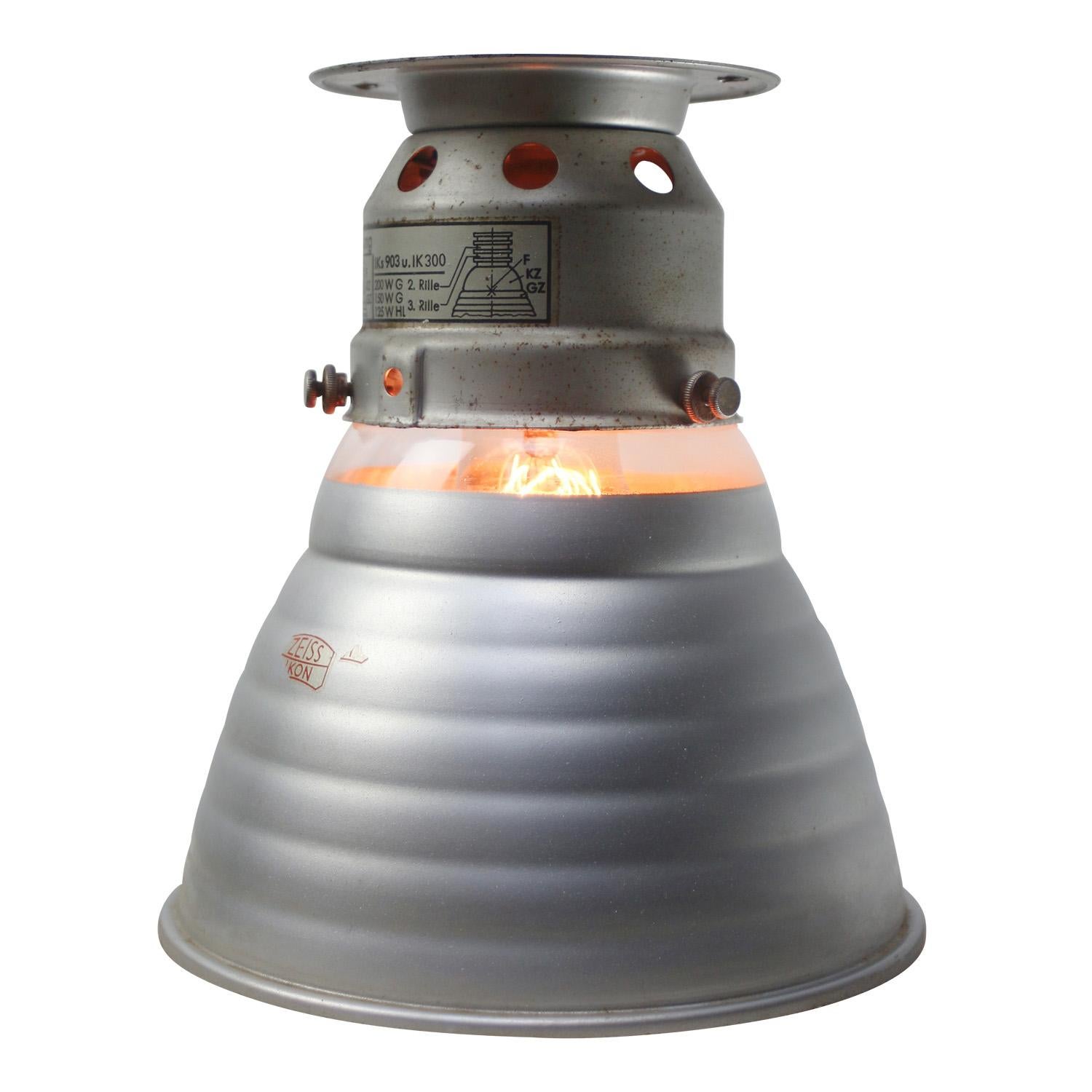 Zeiss Ikon mercury mirror glass flush mount by Adolf Meyer
metal top

Weight: 0.85 kg / 1.9 lb

Priced per individual item. All lamps have been made suitable by international standards for incandescent light bulbs, energy-efficient and LED bulbs.