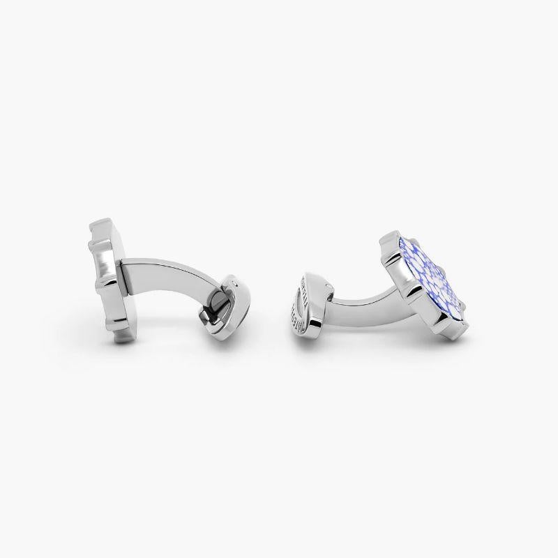 Mercury Navy Blue Leather Cufflinks in Titanium

Named after the Roman deity Mercury, the messenger of the gods, this textured cufflink collection uses blue and white-coloured leather to create the planets surface in a fun, contemporary style.