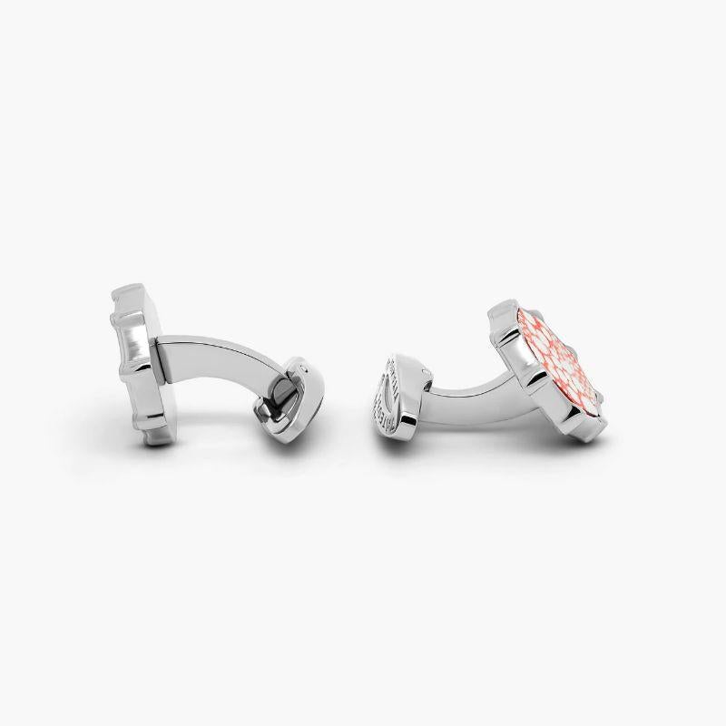 Mercury red leather cufflinks in titanium

Named after the Roman deity Mercury, the messenger of the gods, this textured cufflink collection uses red and white-coloured leather to create the planets surface in a fun, contemporary style. Finished