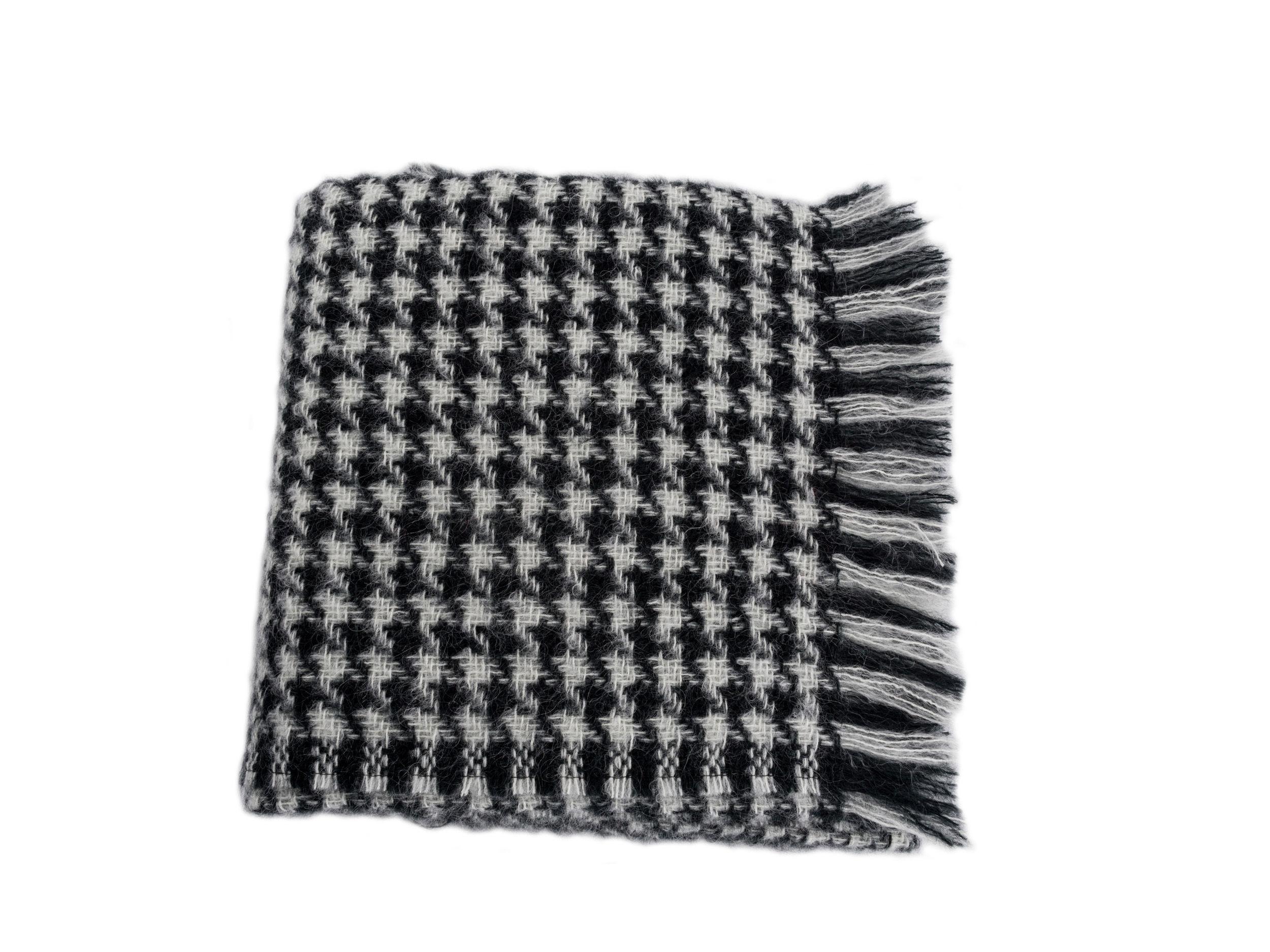 Houndstooth mohair blend throw. Mohair and wool with a touch of nylon. Made in South Africa.
 