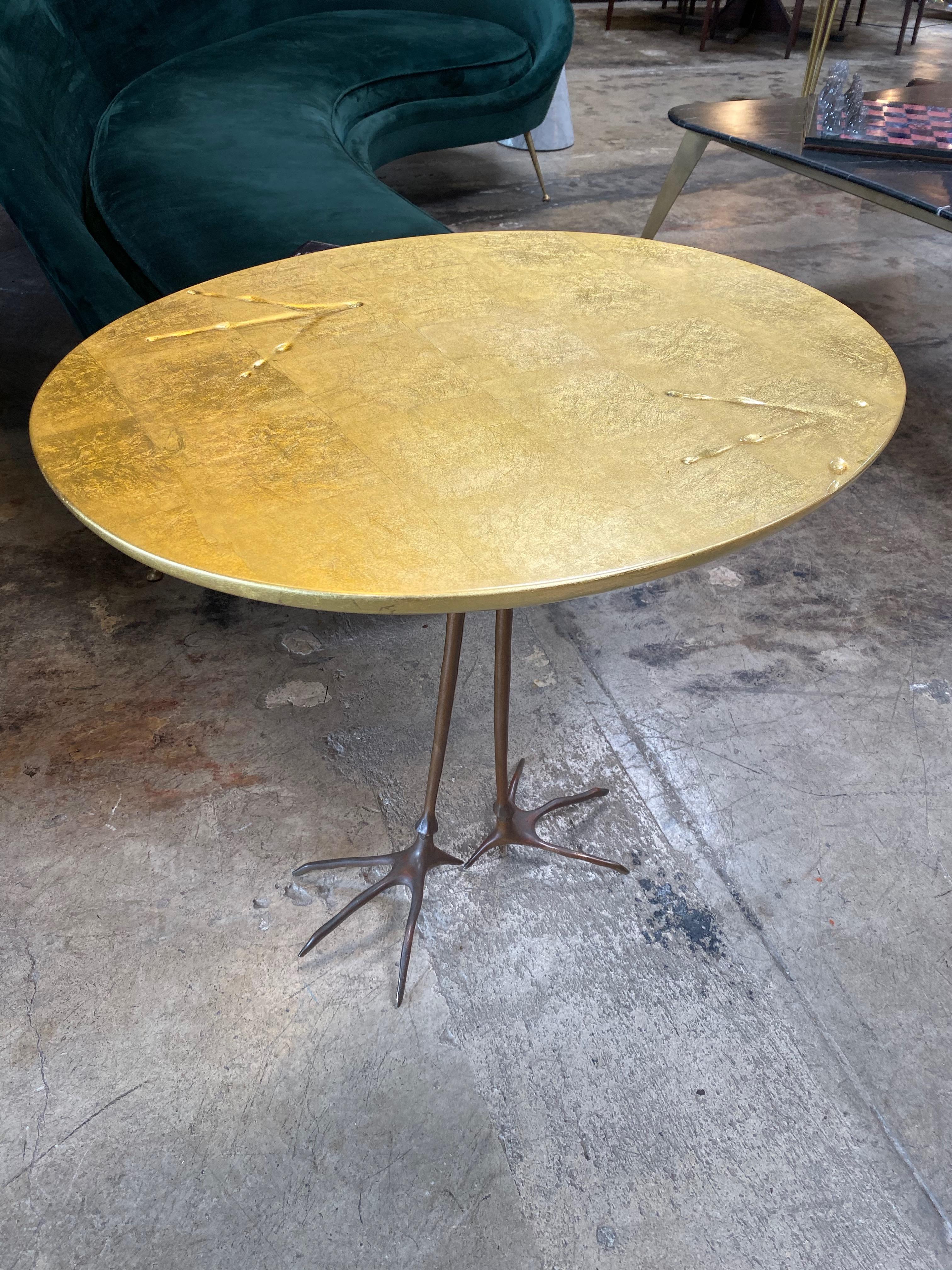 Méret Oppenheim for Simon Gavina, 'Traccia' coffee table, in bronze, gold leaf and wood, Italy, circa 1972.

When animals and furniture meet... This side table by surrealist artist Méret Oppenheim is part of the 1972 serial production of the