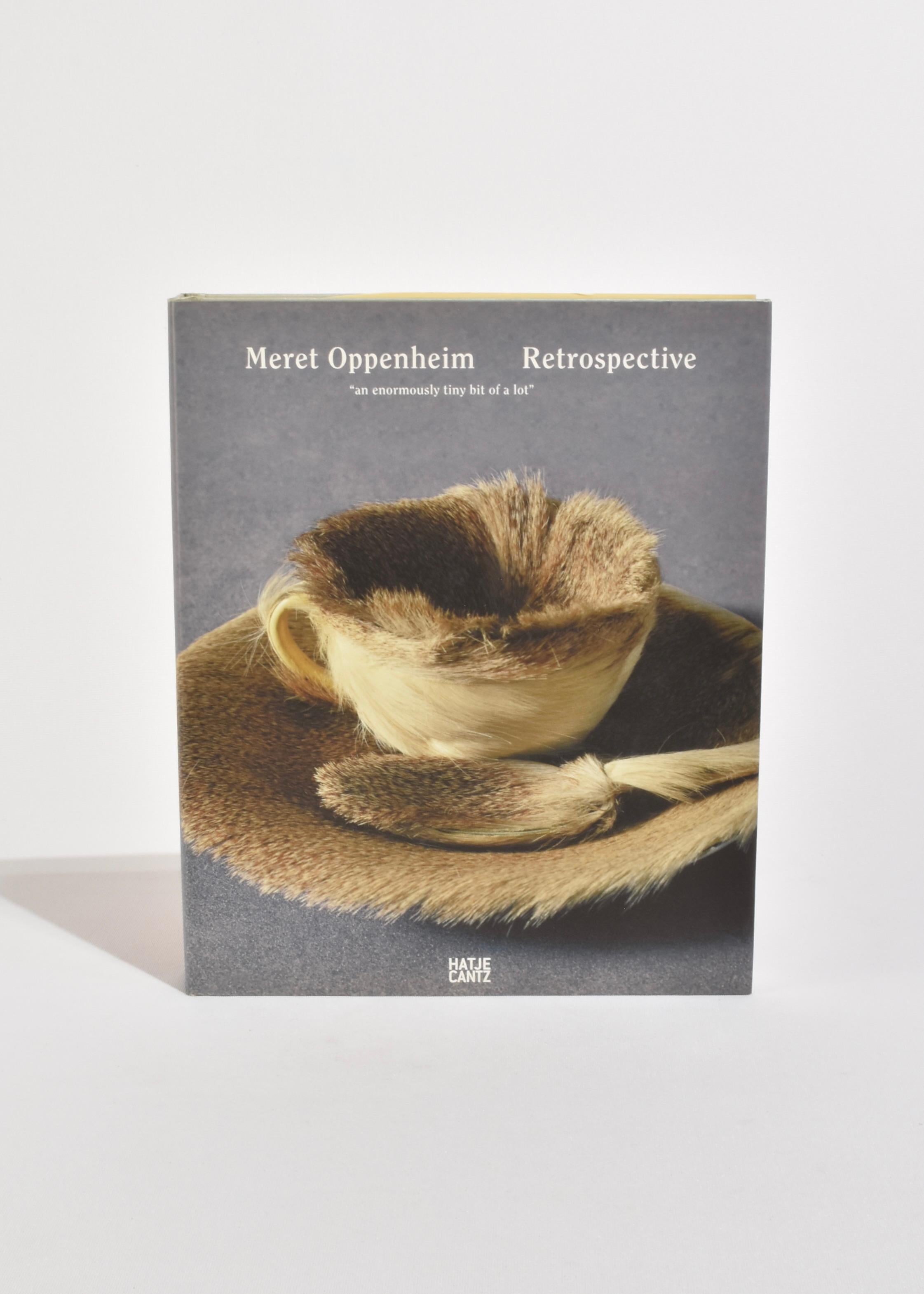 Hardback coffee table book retrospective of artist, Meret Oppenheim. By Hatje Cantz, published in 2007. First edition, 360 pages.

