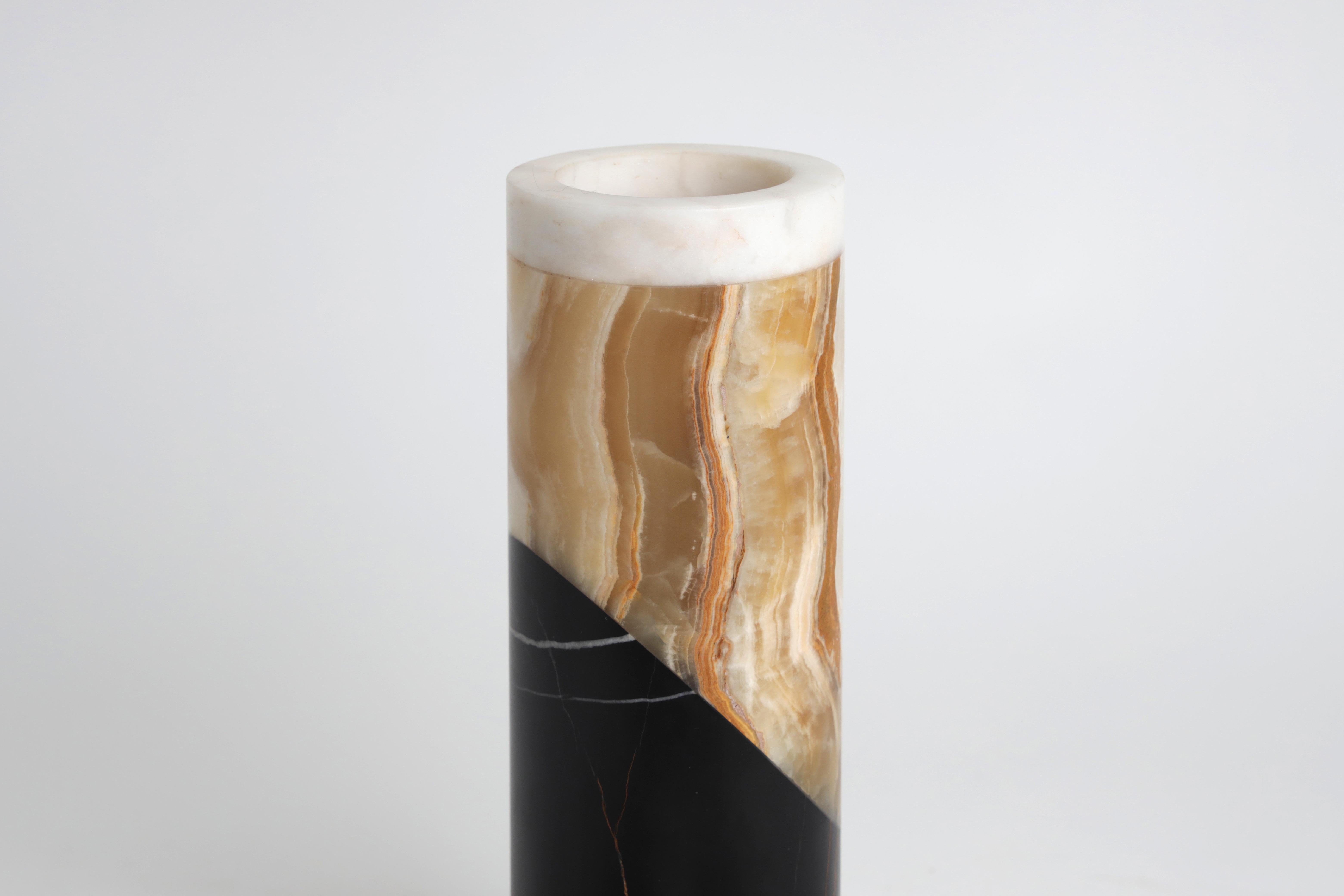This is blasphemy. The impious intersection of materials. The melding of marble and onyx, merged together in an ode to the curve.

Starting from rectangular blocks, they are polished, federated, and put on the turning table and spun, and slowly