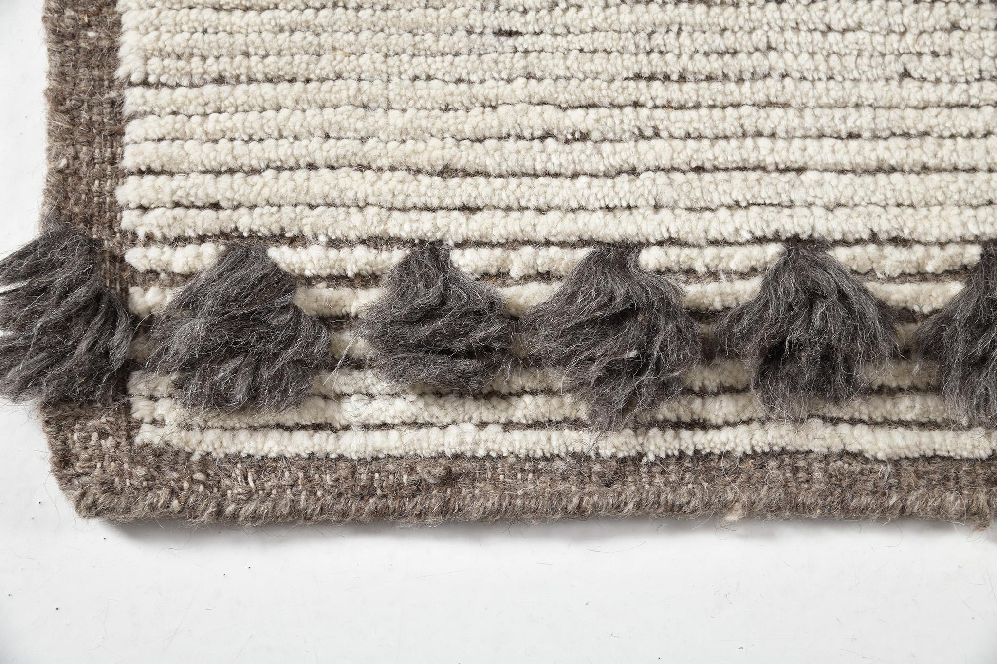 Effortless elegance and charm are imbued in this Barbera’ rug in Estancia Collection. Rendered in the relaxing tones of taupe and ecru, this wonderful rug features dotted and zigzag symmetrical stitches as it lifts up the character of this