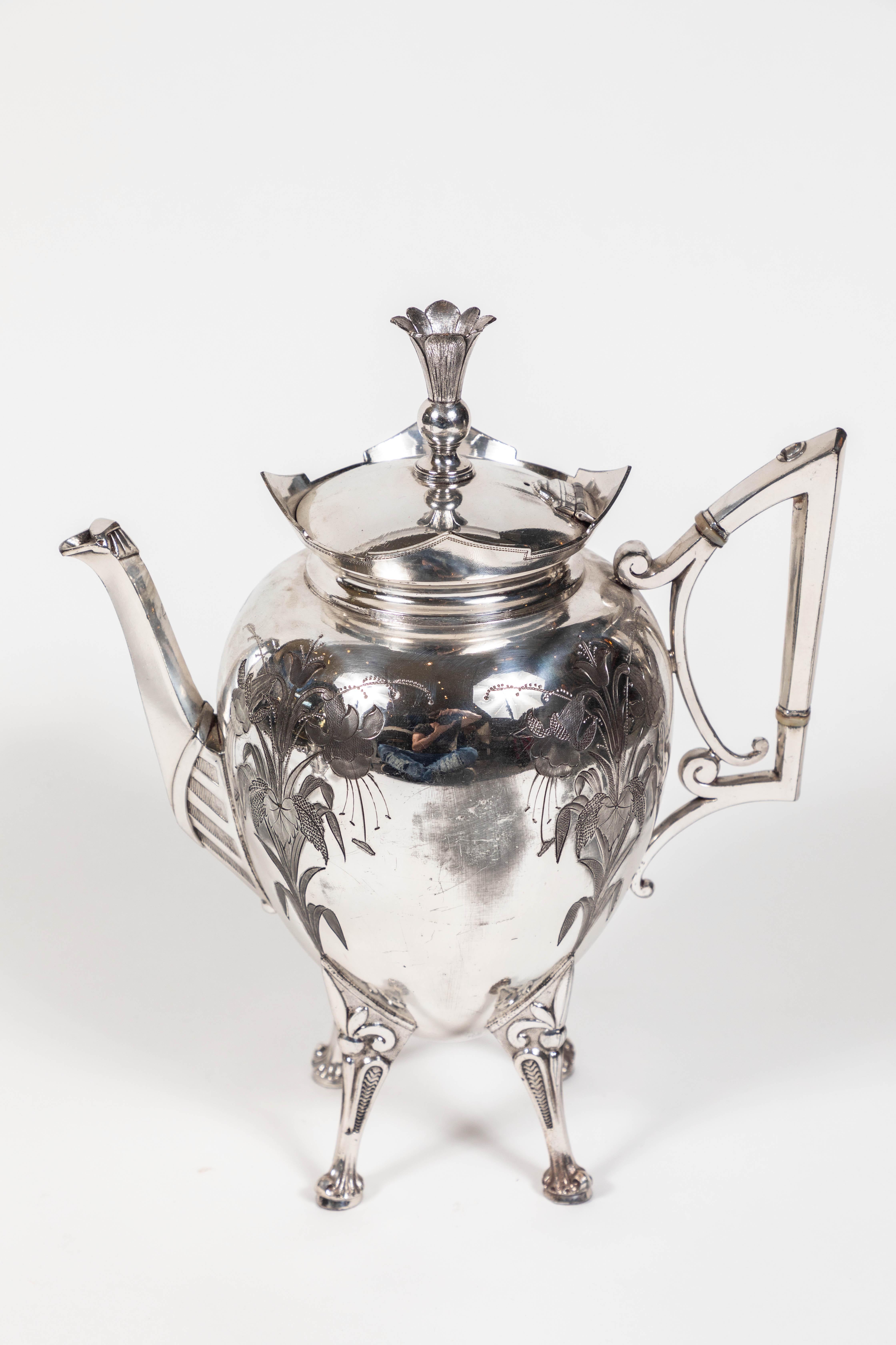 Meriden Britannia company Victorian silver plate coffee set with coffee pot cream, sugar, and matching jar with lid.

Measures: Coffee: 6.5 x 9.5 x 11.5
Jar with Lid: 7 x 6 x 8.5
Cream: 6x 2.5 x 6.5
Sugar: 6 x 3.5 x 5

The Meriden Britannia